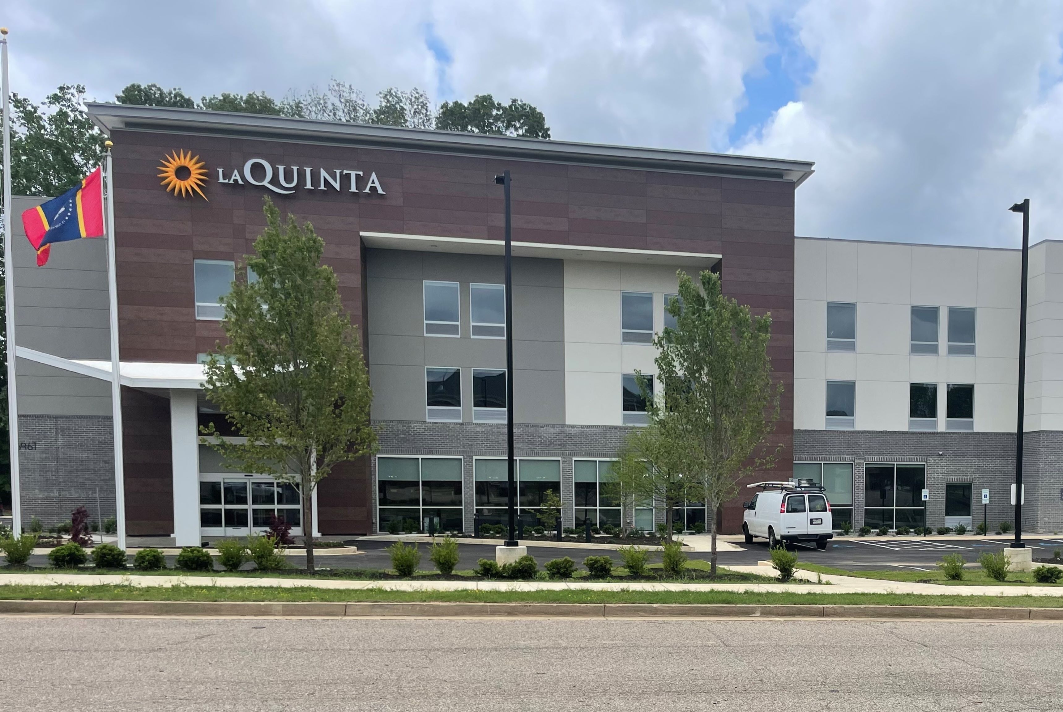 Exterior of La Quinta Inn & Suites by Wyndham Olive Branch hotel in Olive Branch, Mississippi