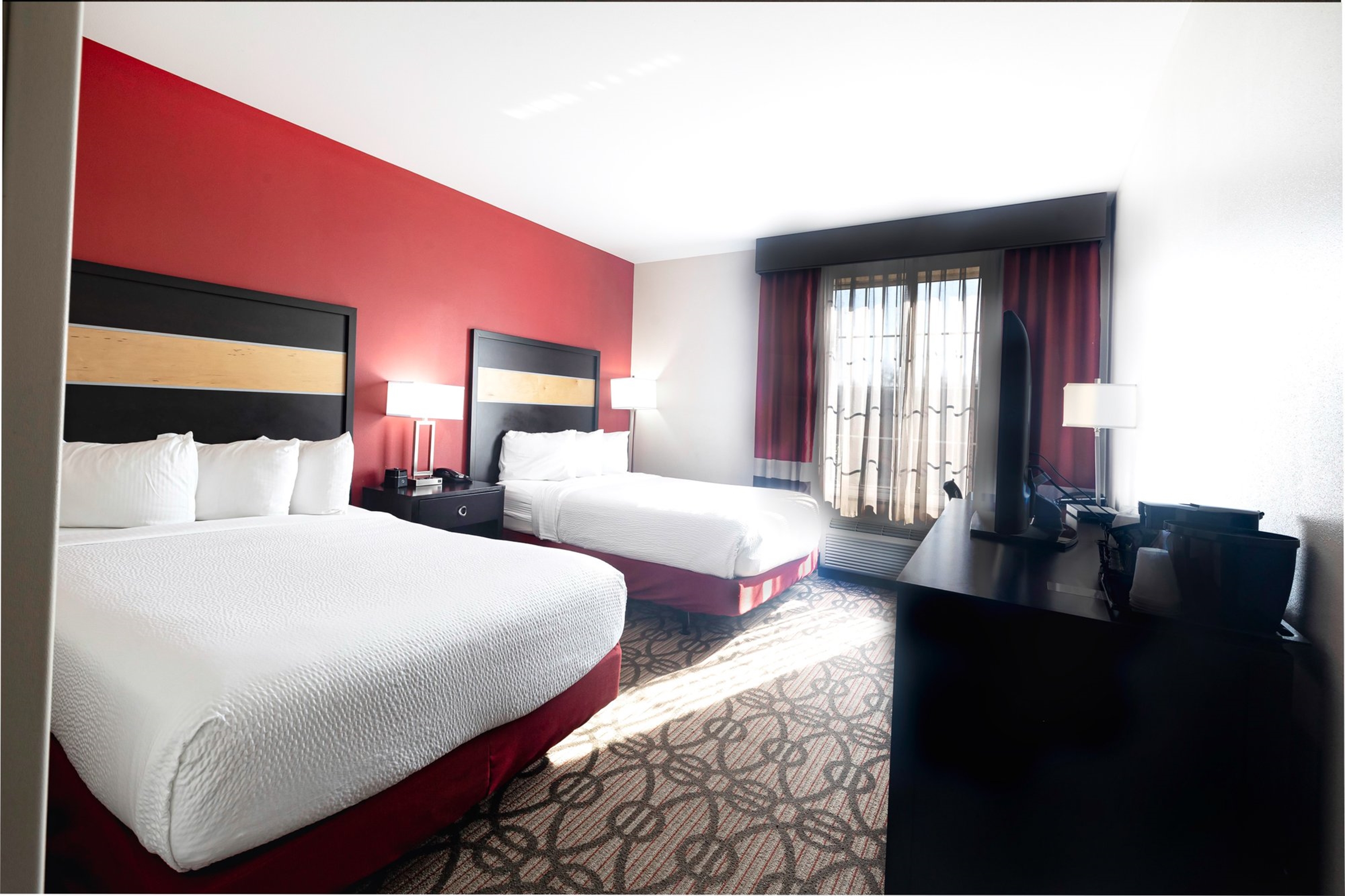 Guest room at the La Quinta Inn & Suites by Wyndham Starkville at MSU in Starkville, Mississippi