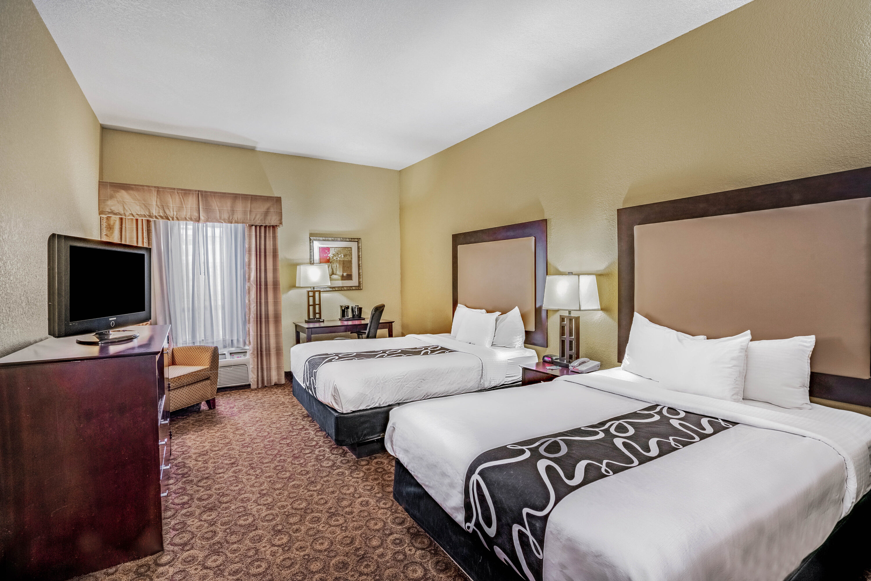 Guest room at the La Quinta Inn & Suites by Wyndham Vicksburg in Vicksburg, Mississippi