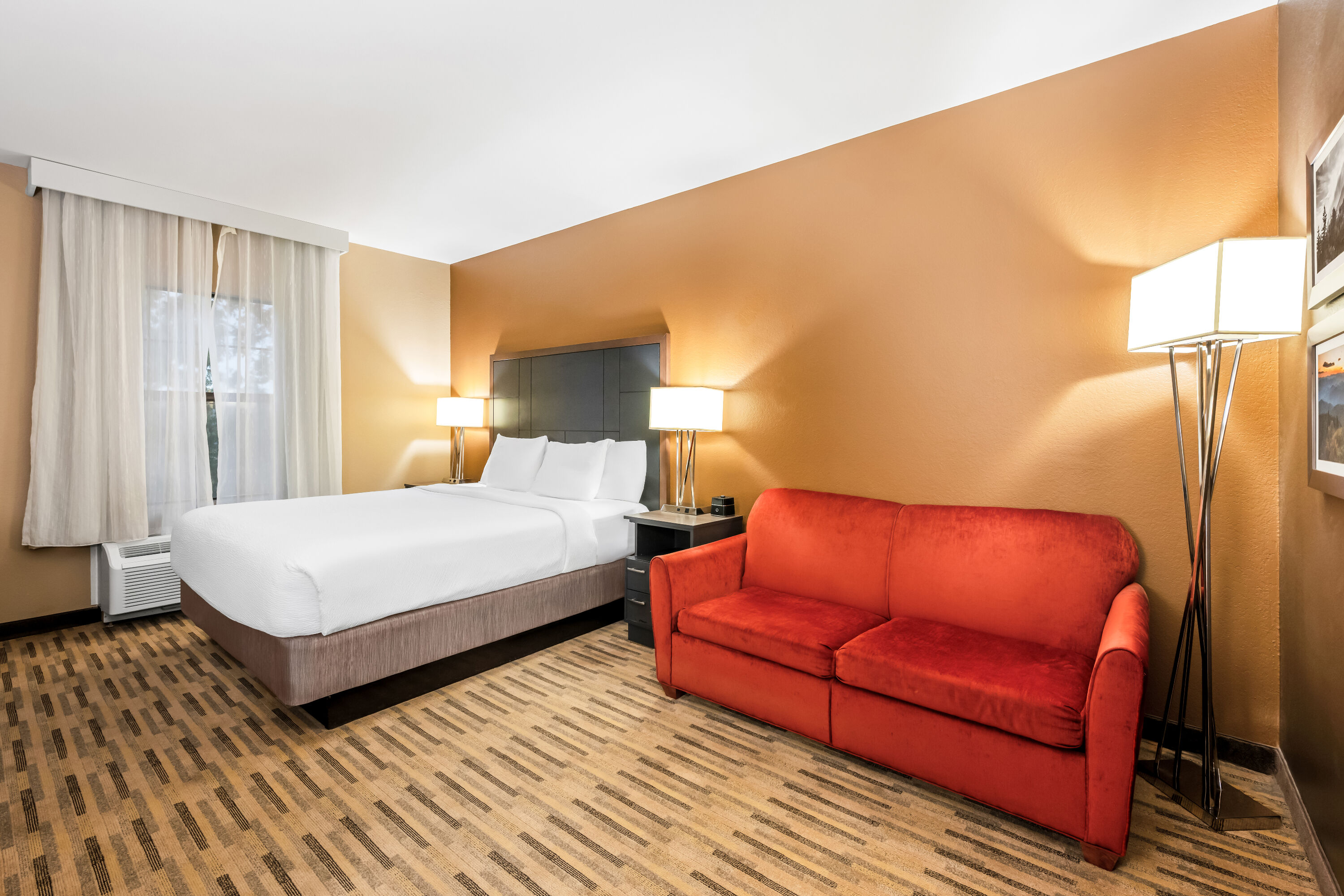 King bed guest room at the La Quinta Inn & Suites by Wyndham Boone University in Boone, North Carolina