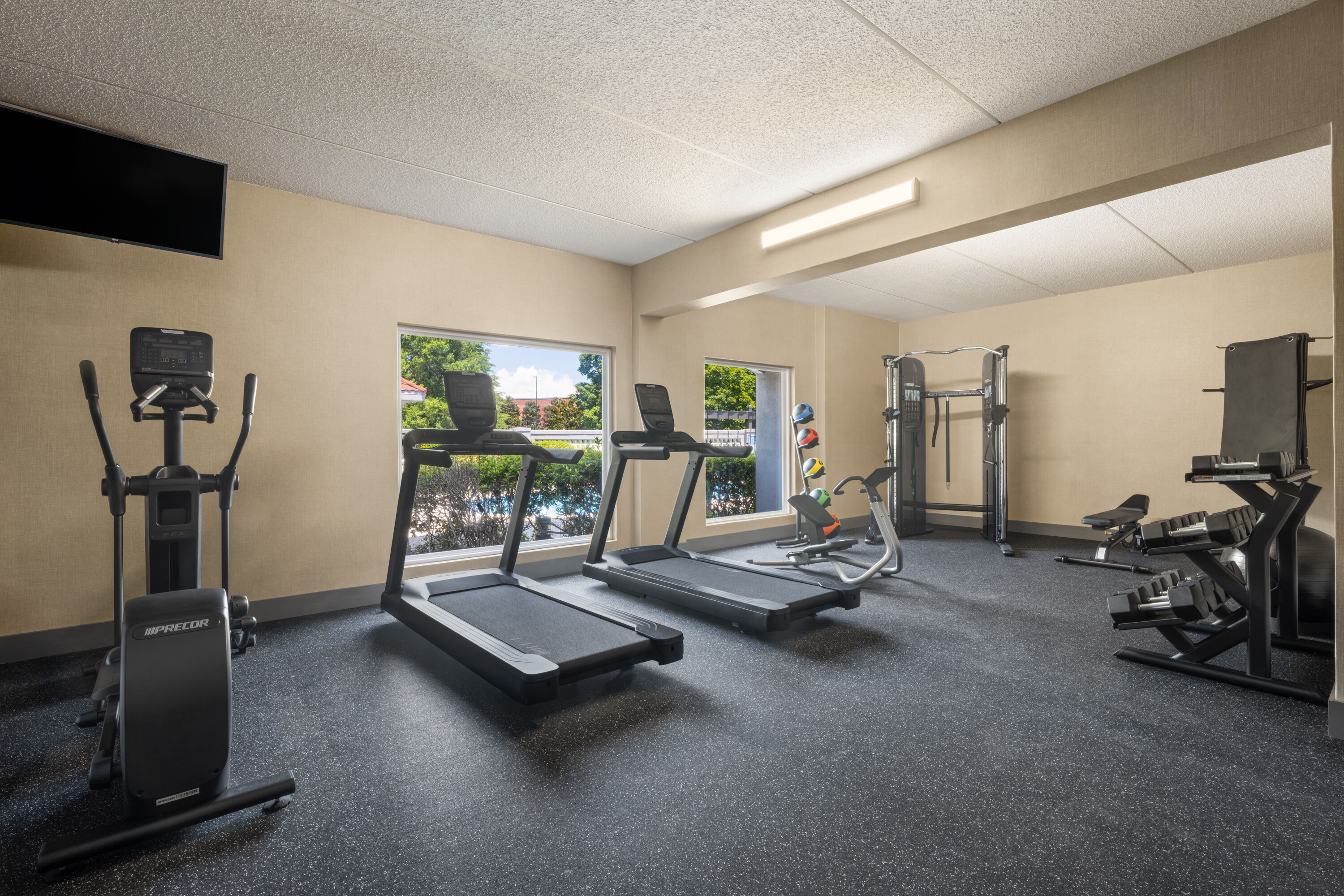 Fitness room at La Quinta Inn & Suites by Wyndham Raleigh Cary in Cary, North Carolina