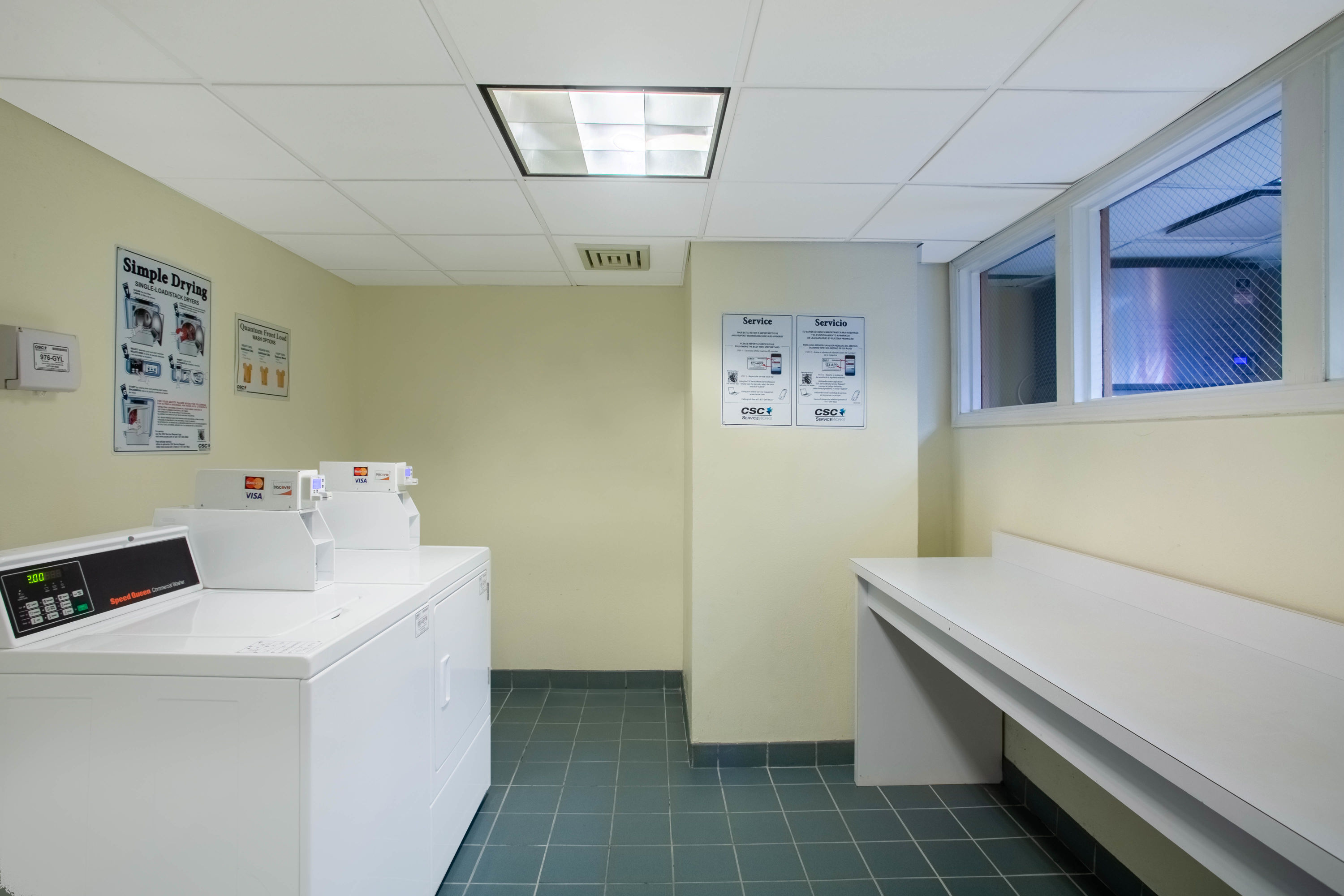 Laundry facilities at La Quinta Inn & Suites by Wyndham Charlotte Airport South in Charlotte, North Carolina