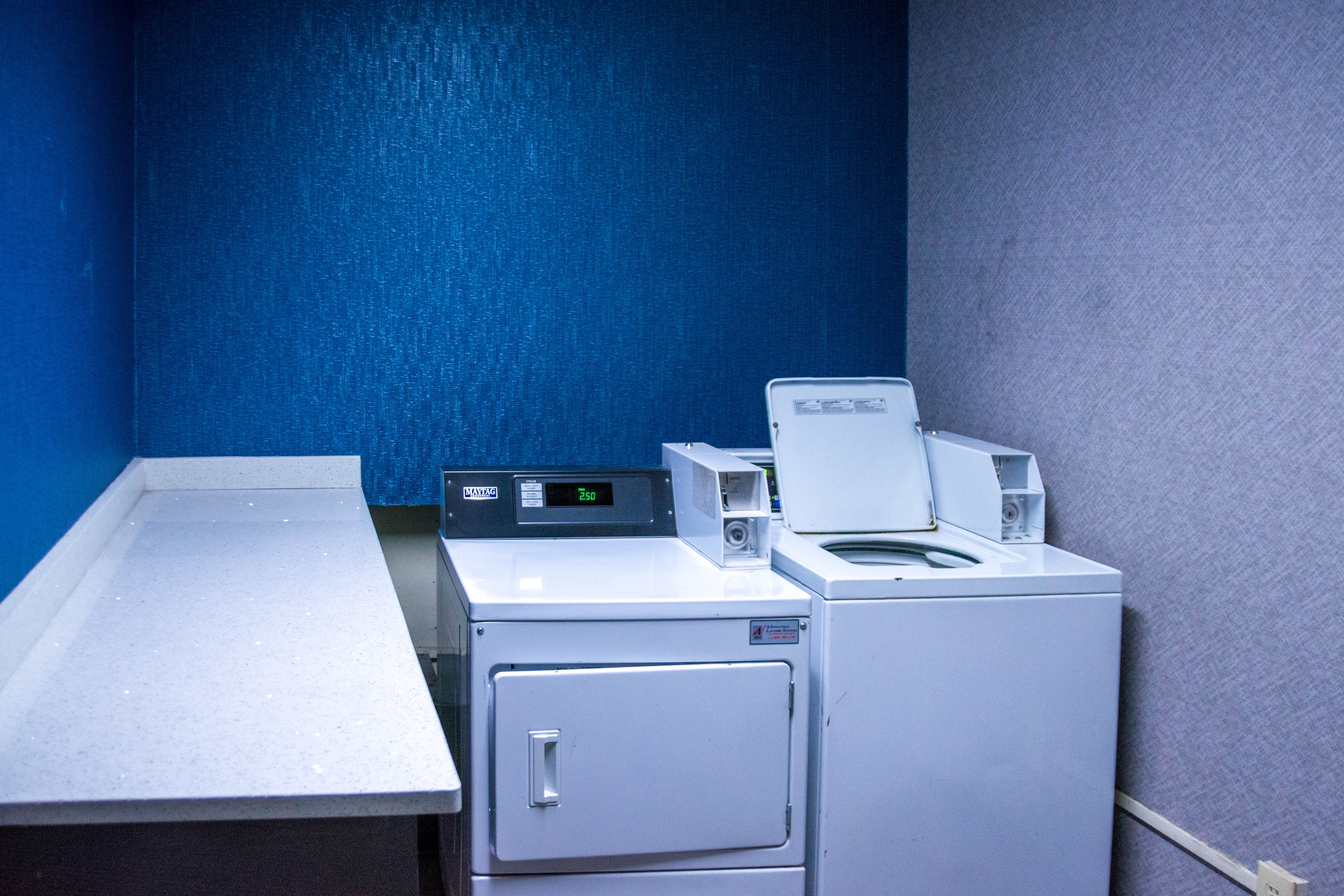 Laundry facilities at La Quinta Inn & Suites by Wyndham Fayetteville I-95 in Fayetteville, North Carolina