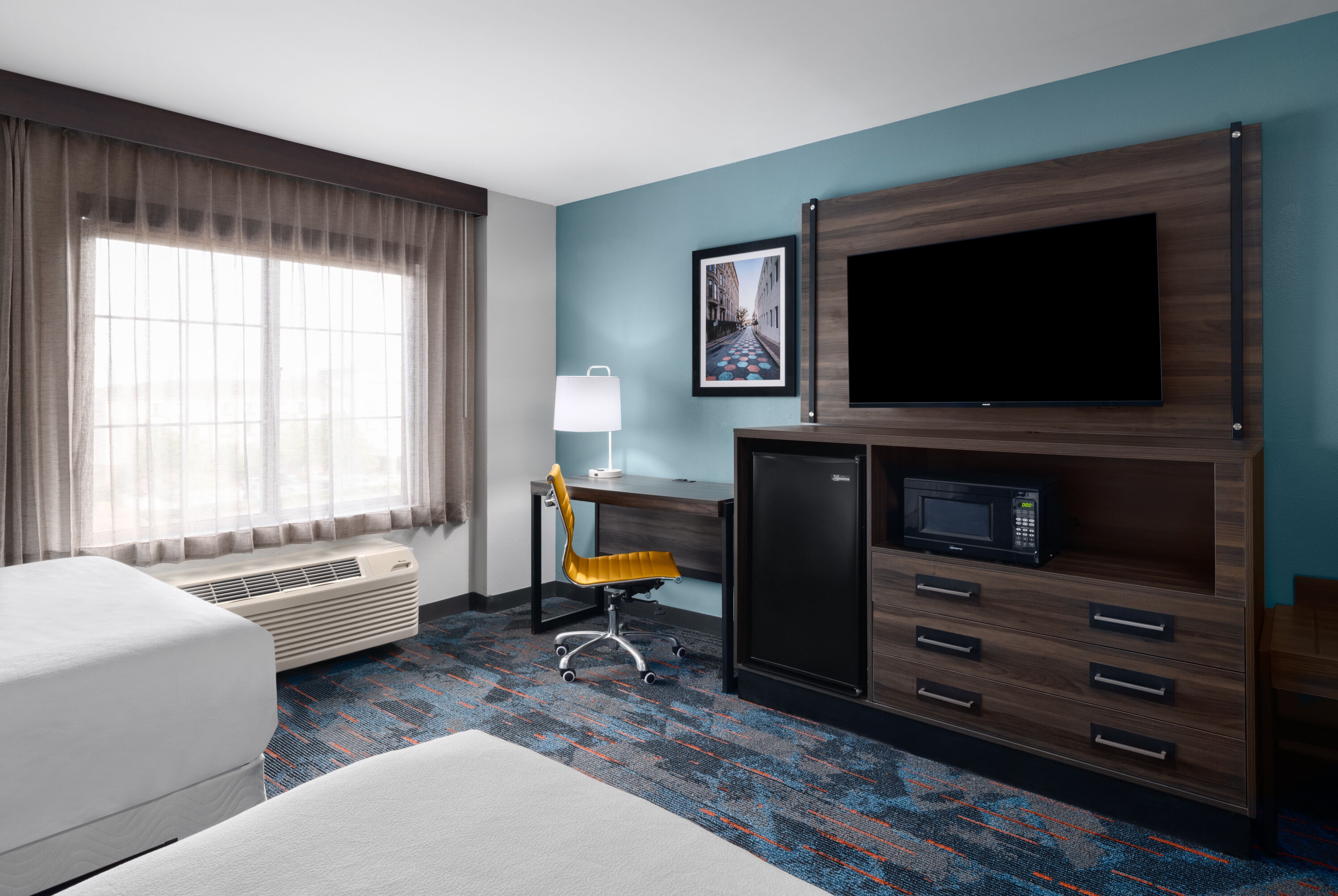 Guest room at the La Quinta Inn & Suites by Wyndham Greensboro NC in Greensboro, North Carolina