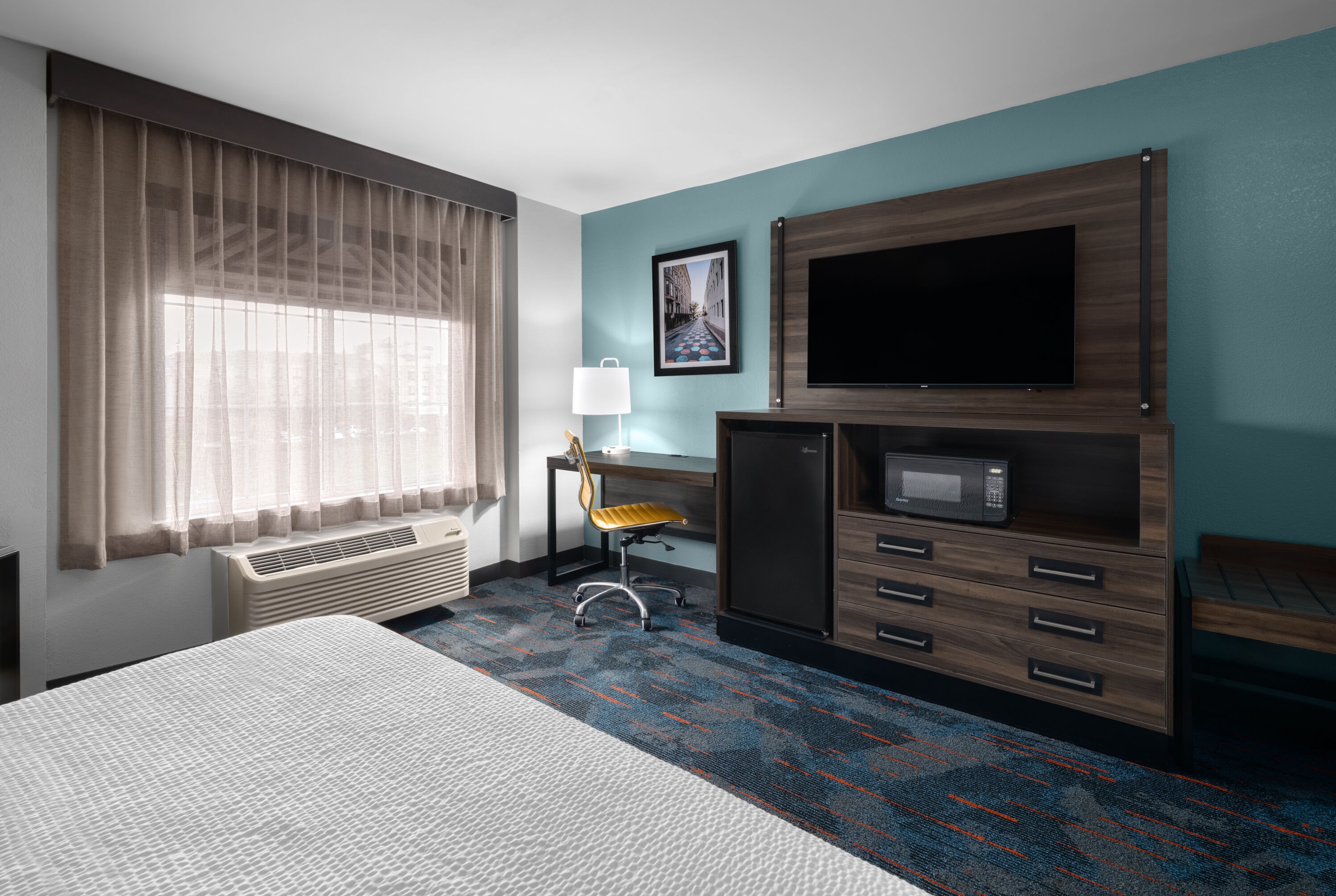 Guest room at the La Quinta Inn & Suites by Wyndham Greensboro NC in Greensboro, North Carolina