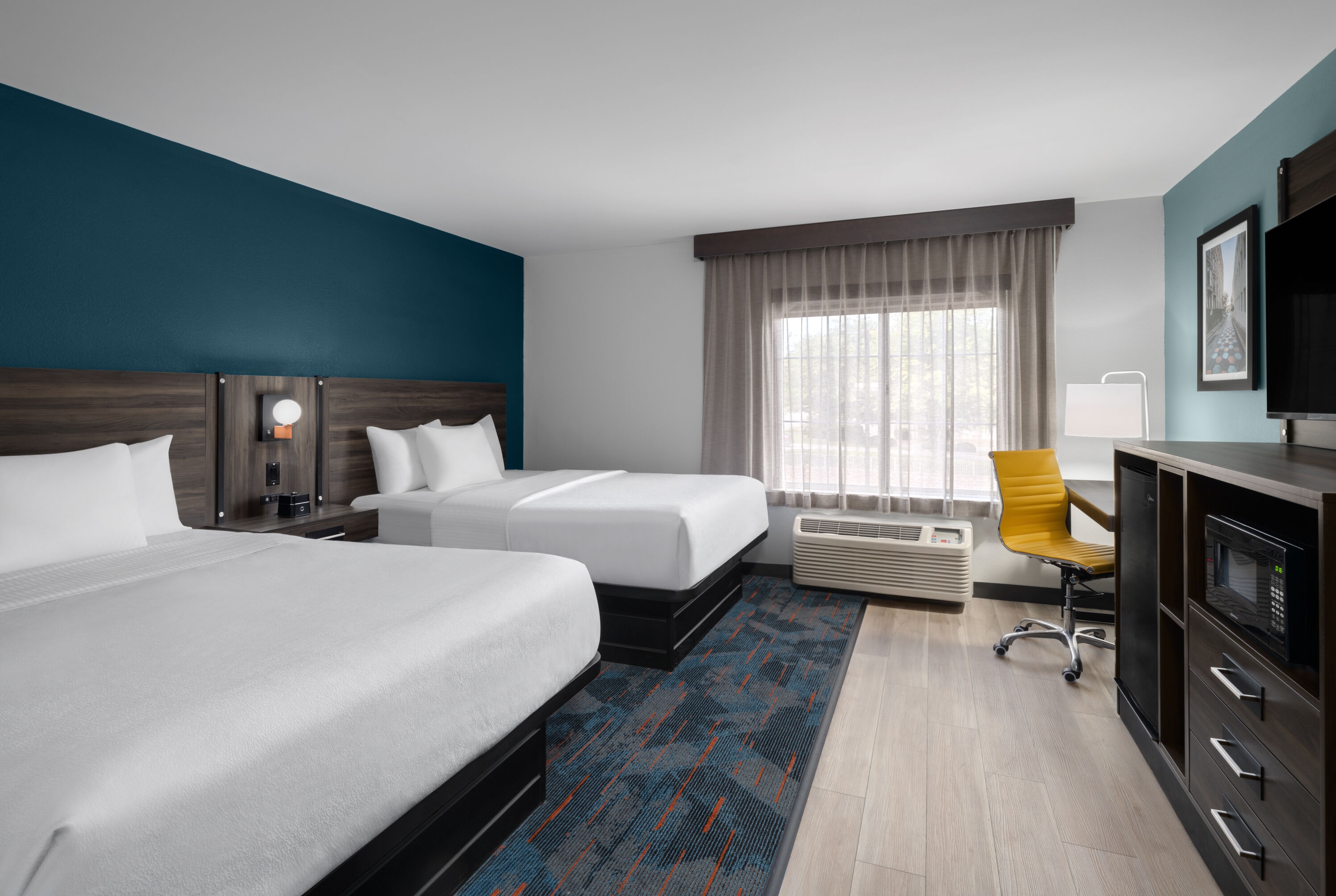 Guest room at the La Quinta Inn & Suites by Wyndham Greensboro NC in Greensboro, North Carolina