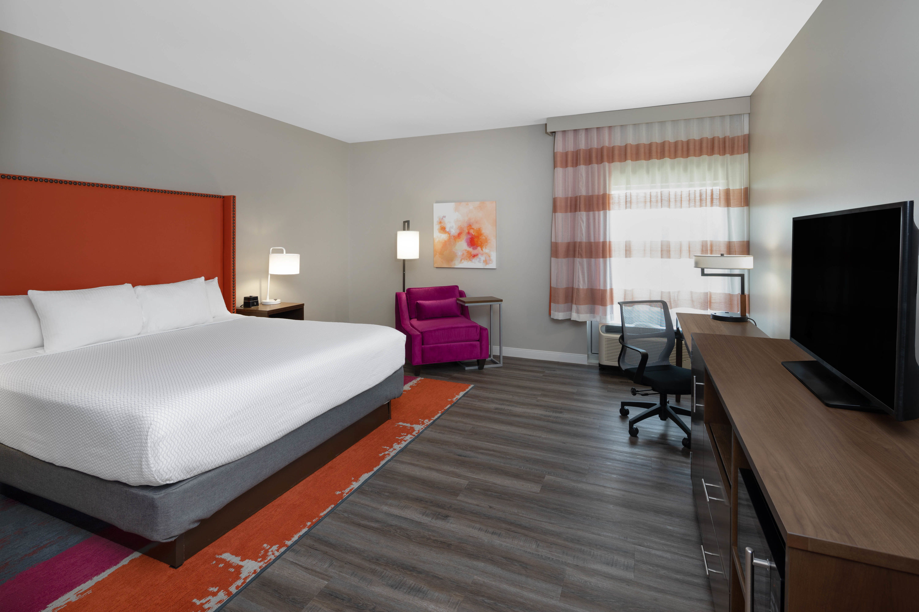 Guest room at the La Quinta Inn & Suites by Wyndham Greensboro Arpt High Point in Greensboro, North Carolina