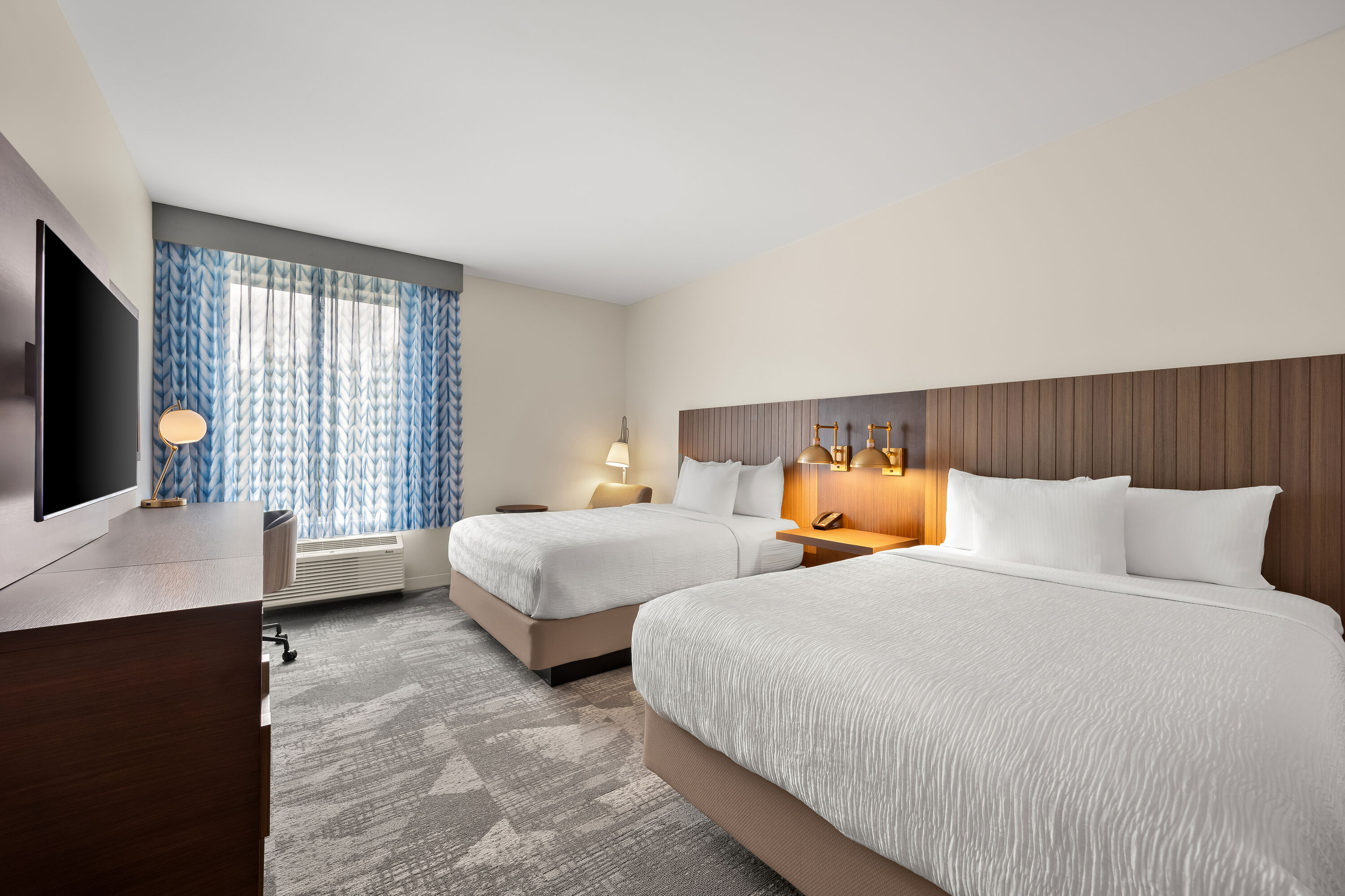 Double bed guest room at the La Quinta Inn & Suites by Wyndham Mebane in Mebane, North Carolina
