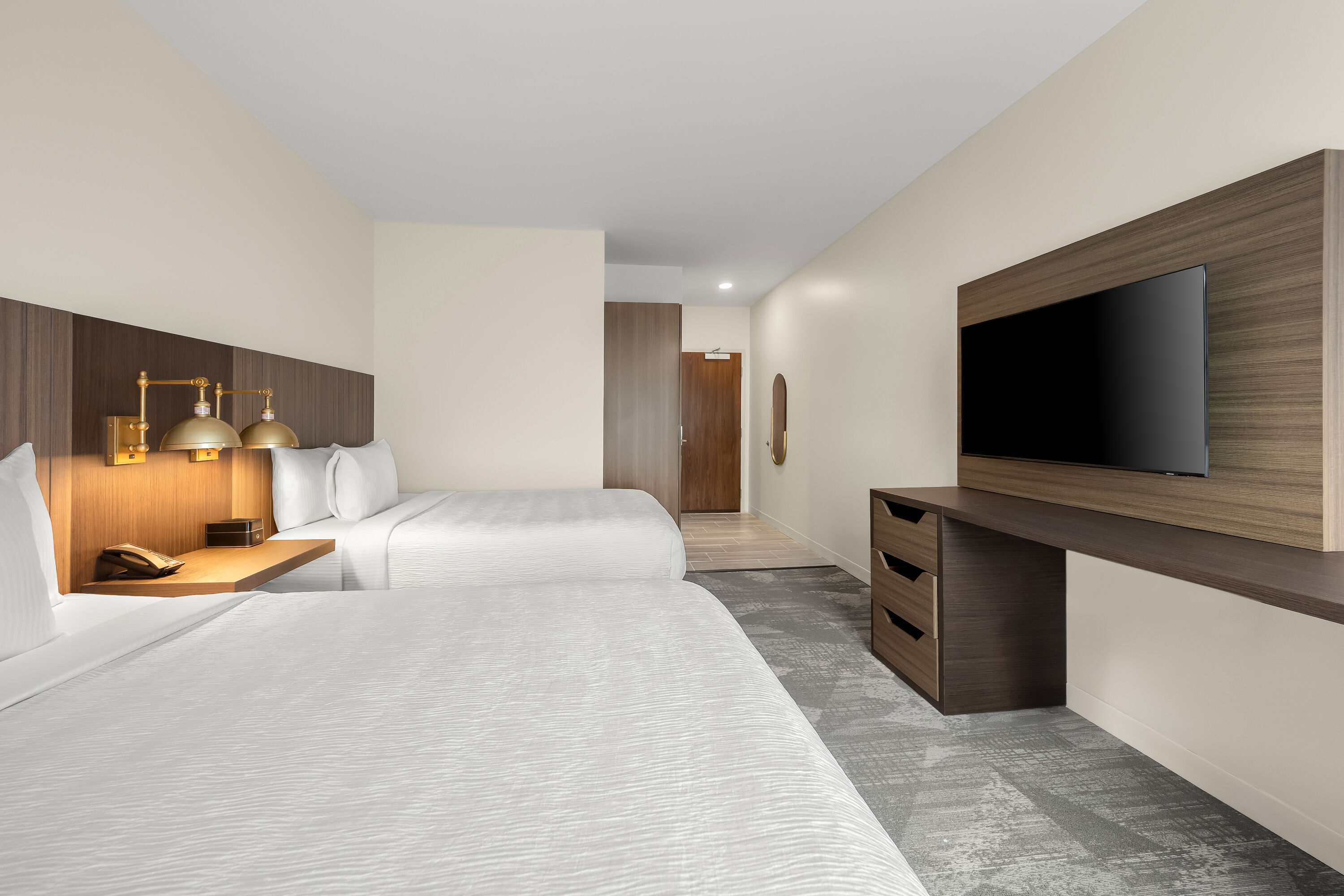 Double bed guest room at the La Quinta Inn & Suites by Wyndham Mebane in Mebane, North Carolina