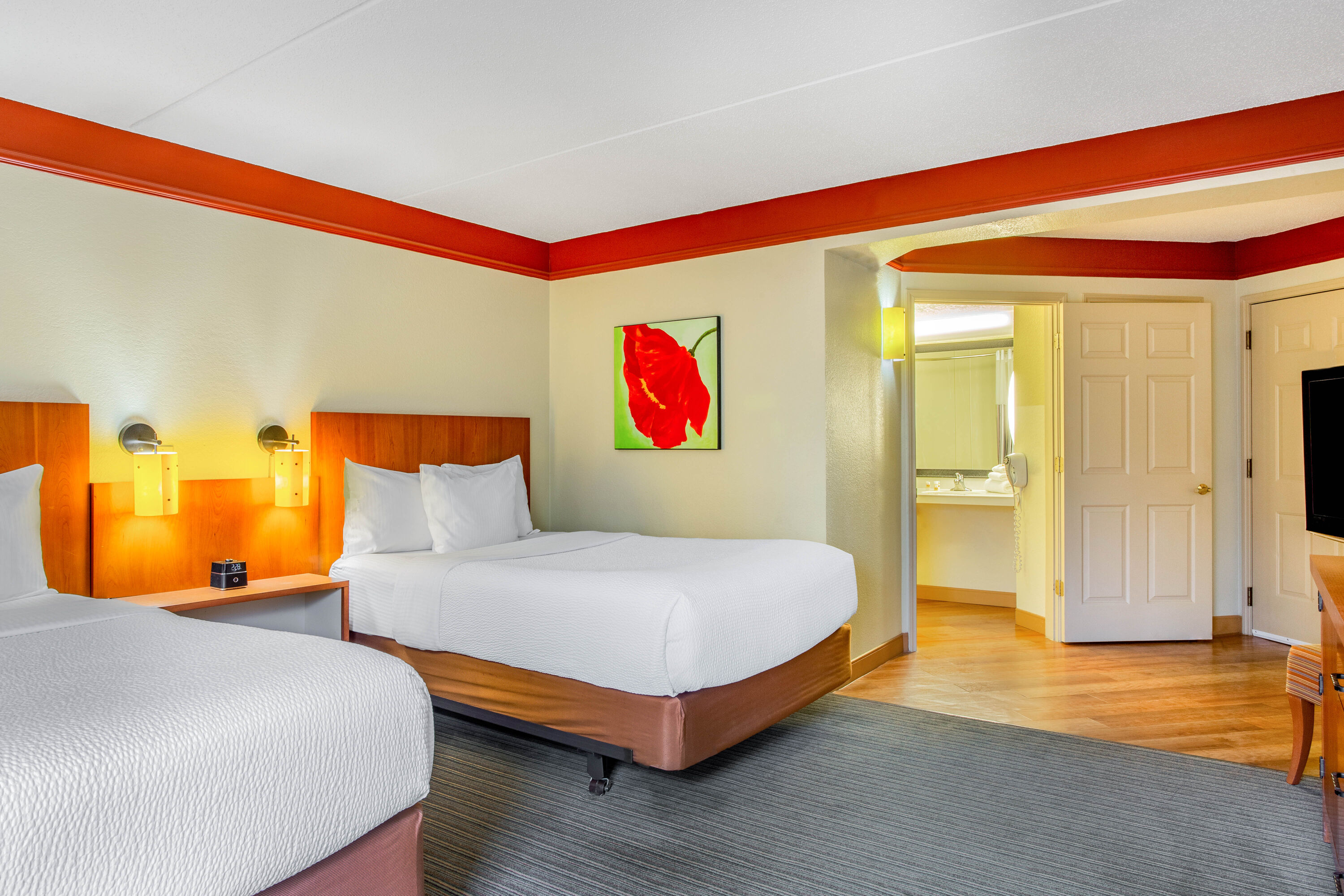 Guest room at the La Quinta Inn & Suites by Wyndham Raleigh Crabtree in Raleigh, North Carolina