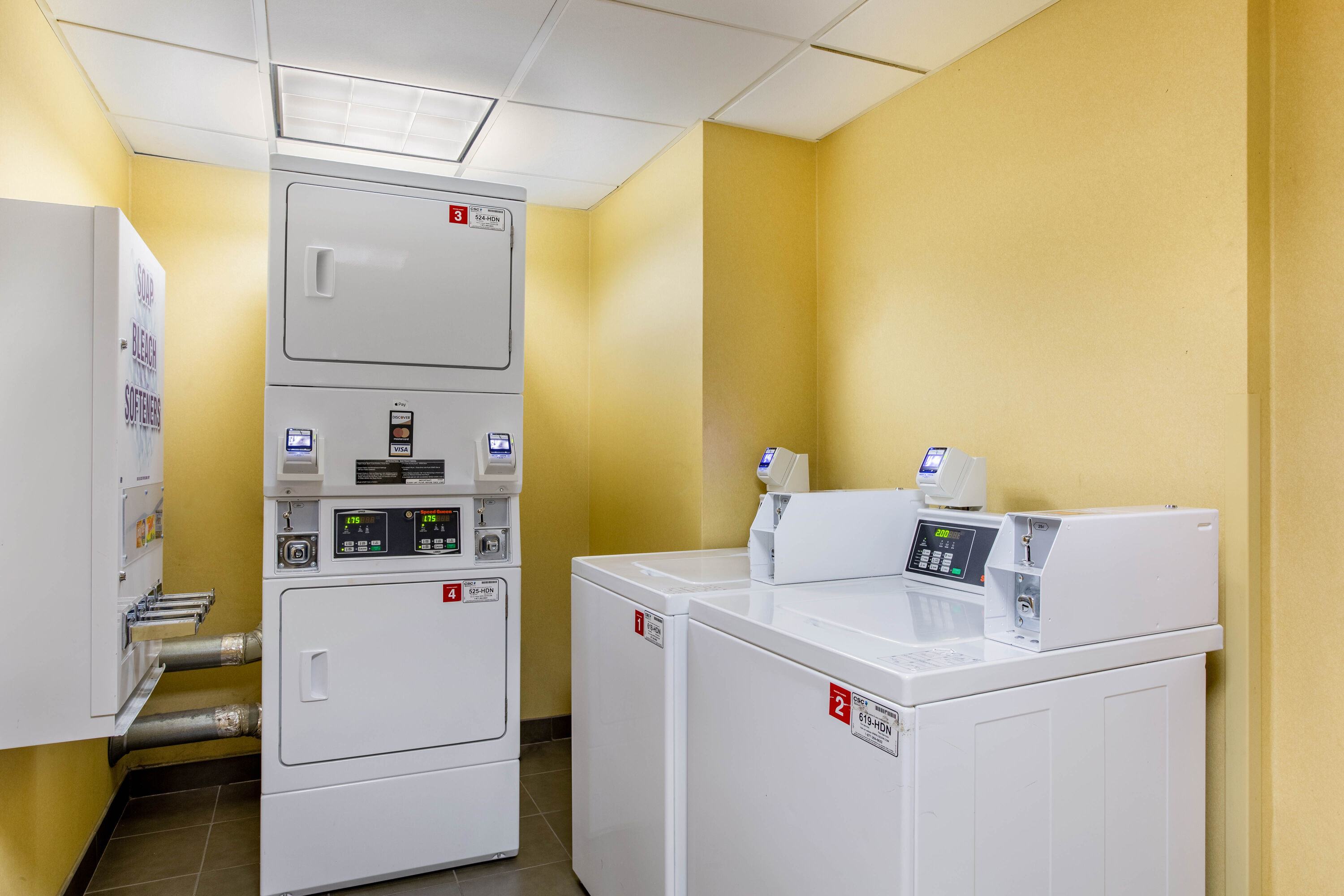 Laundry facilities at La Quinta Inn & Suites by Wyndham Raleigh Crabtree in Raleigh, North Carolina