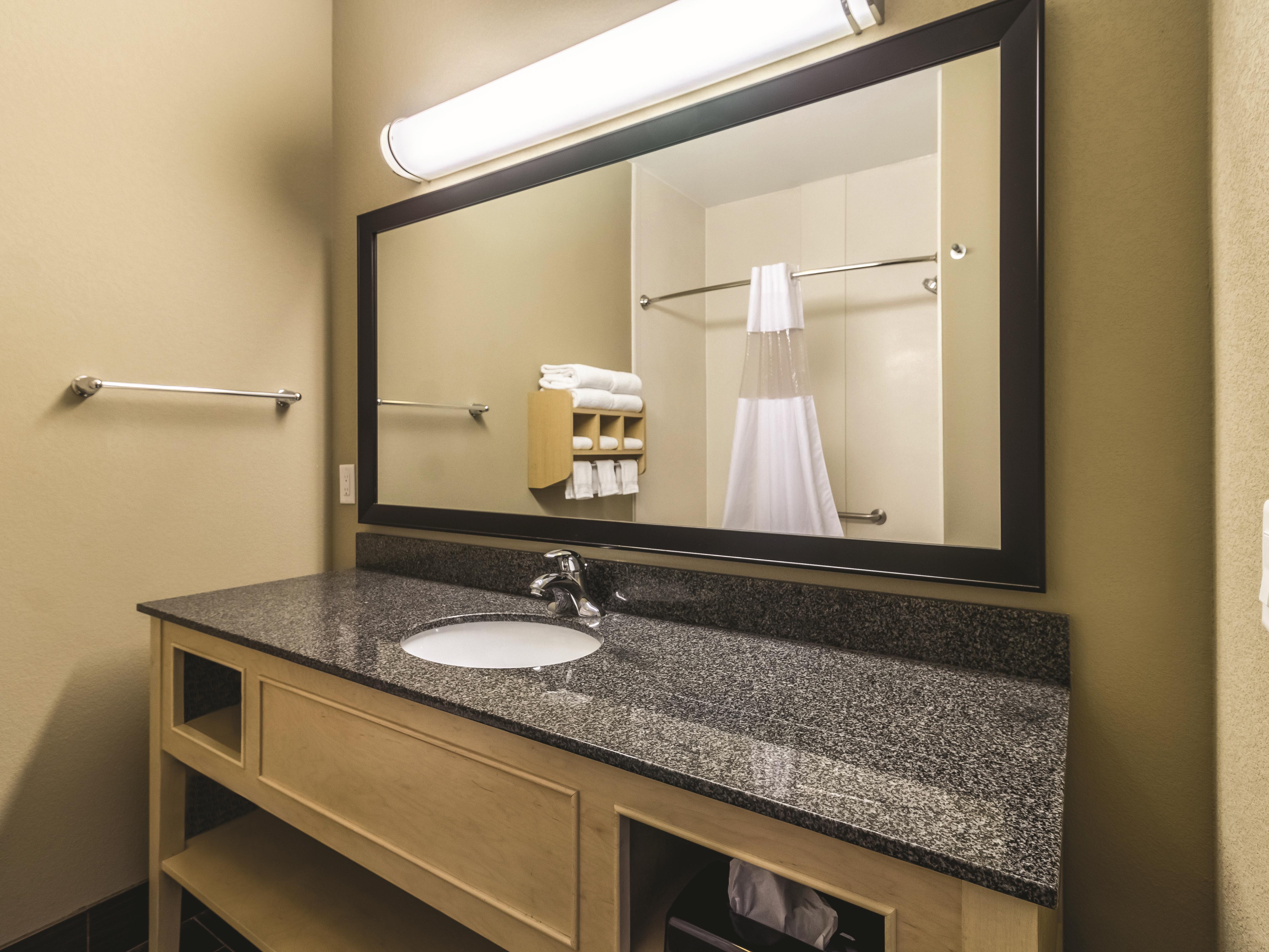 Guest room bath at the La Quinta Inn & Suites by Wyndham Fargo-Medical Center in Fargo, North Dakota