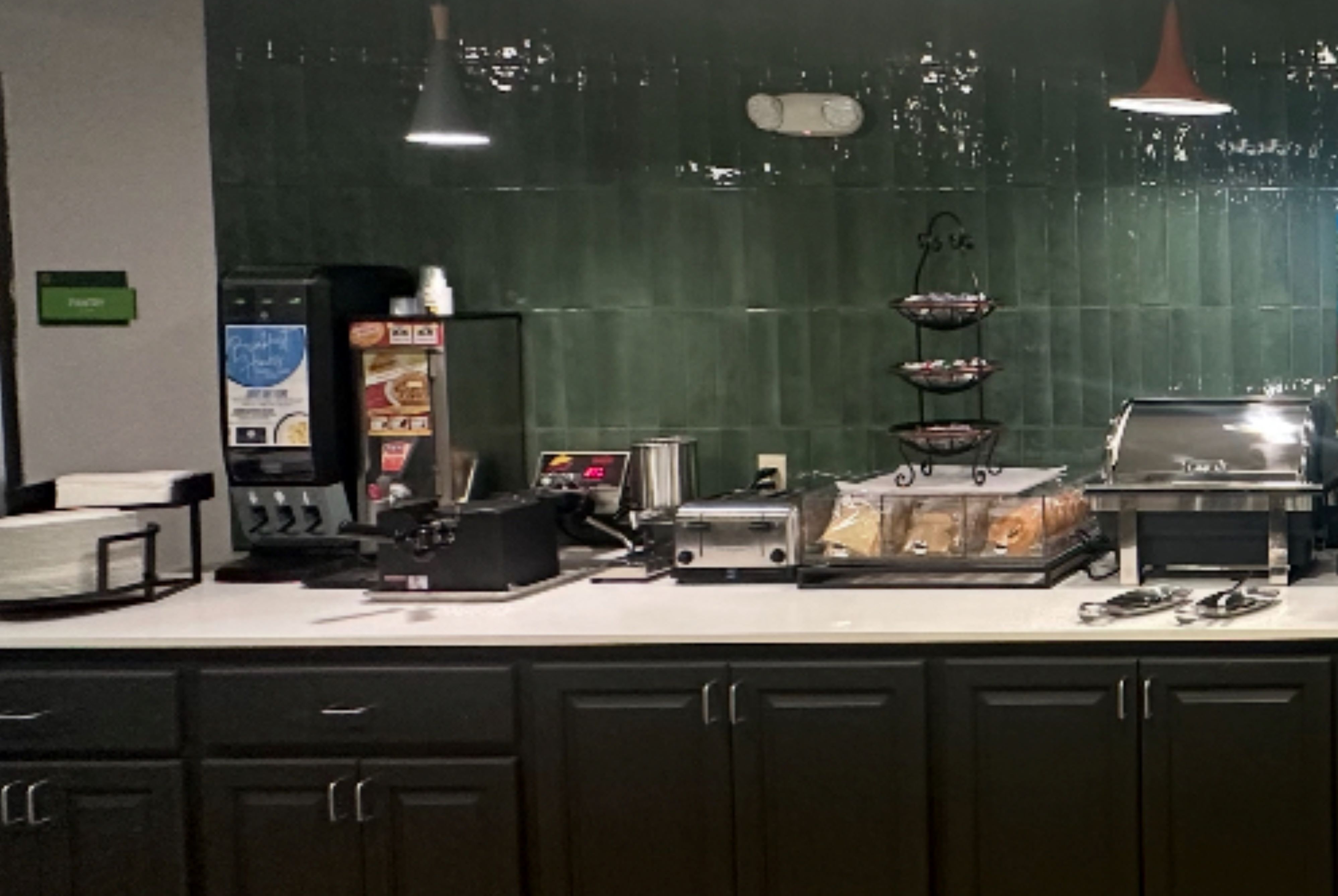 La Quinta Inn & Suites by Wyndham Minot restaurant breakfast area with seating in Minot, North Dakota