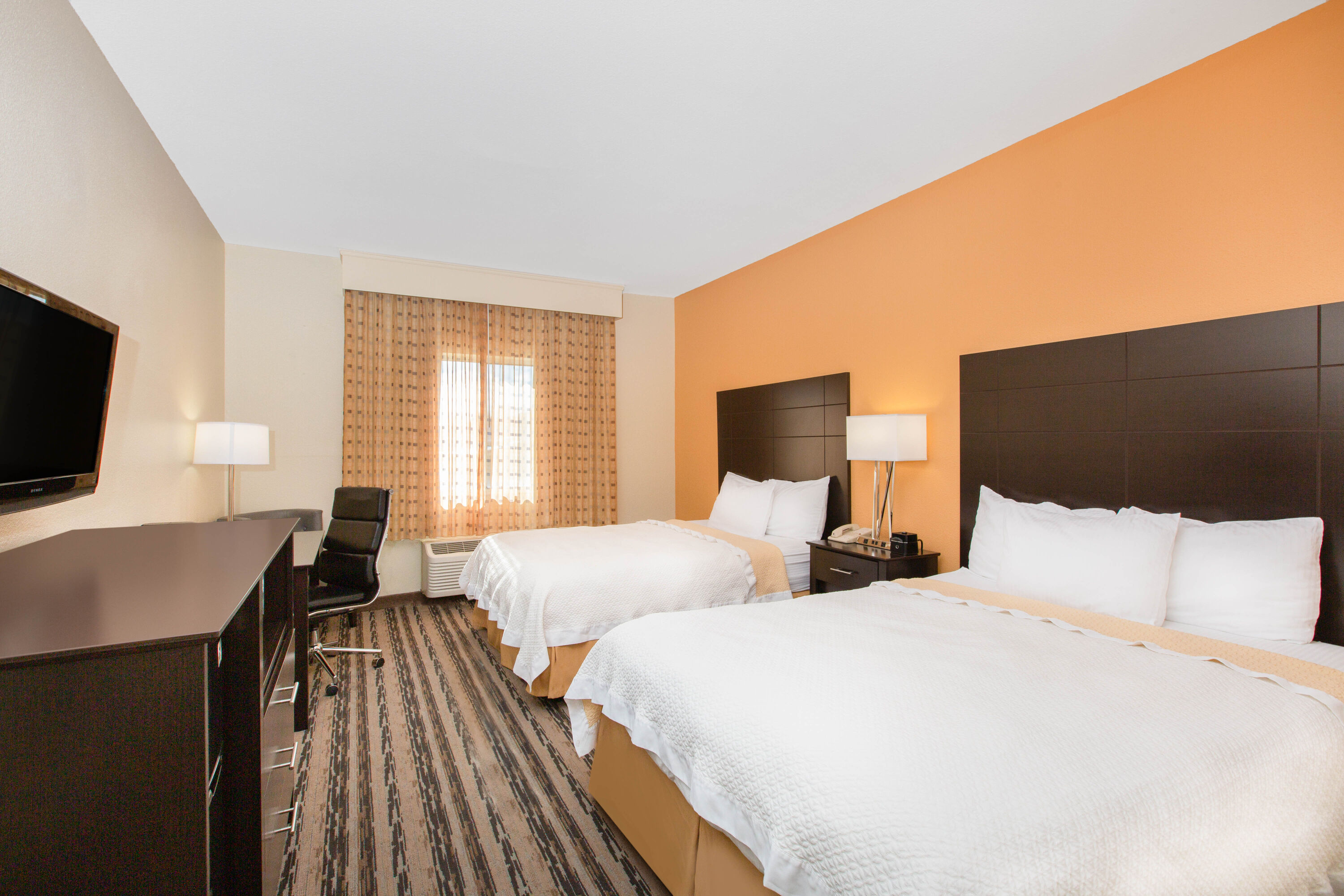 Guest room at the La Quinta Inn by Wyndham Lincoln in Lincoln, Nebraska
