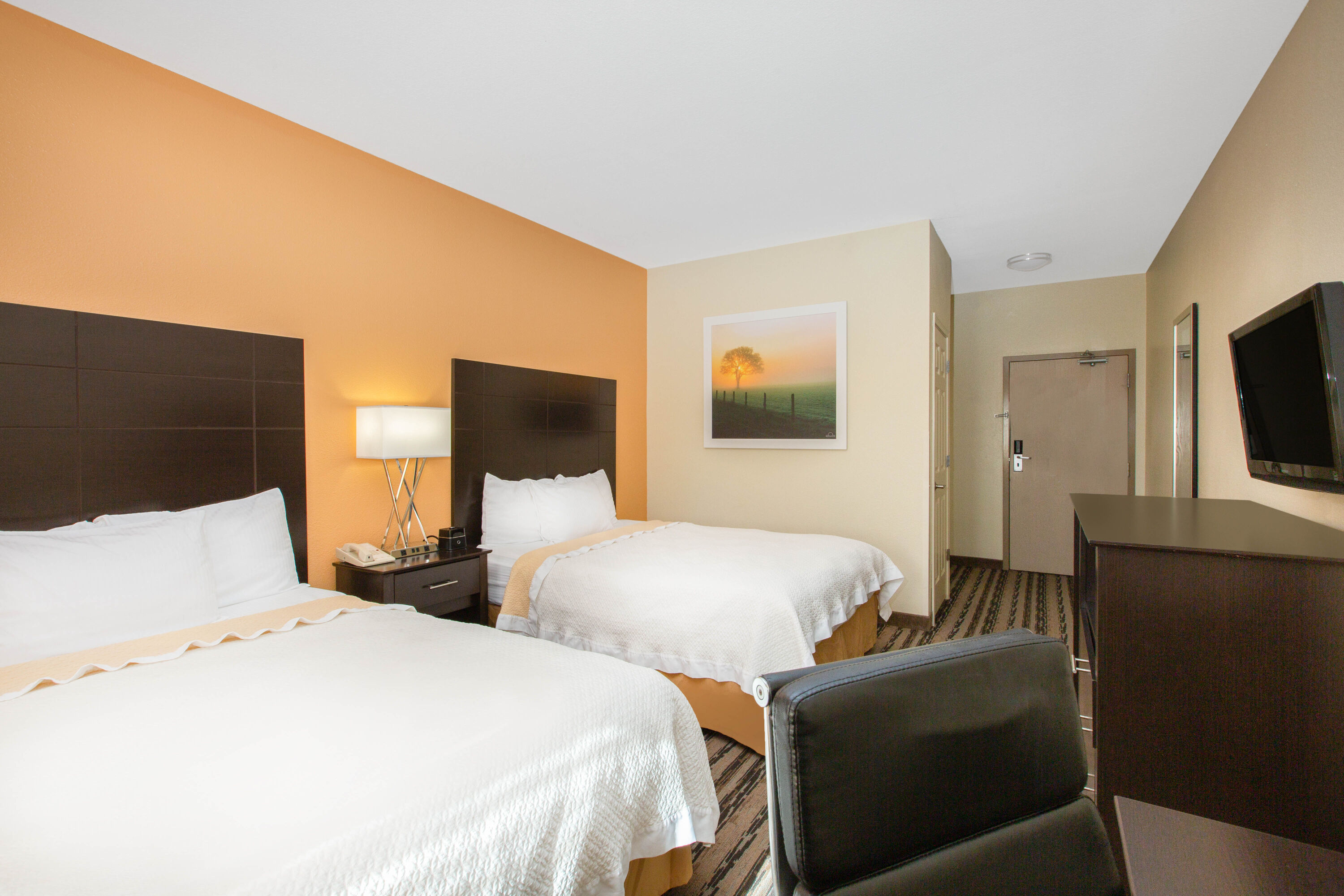 Guest room at the La Quinta Inn by Wyndham Lincoln in Lincoln, Nebraska