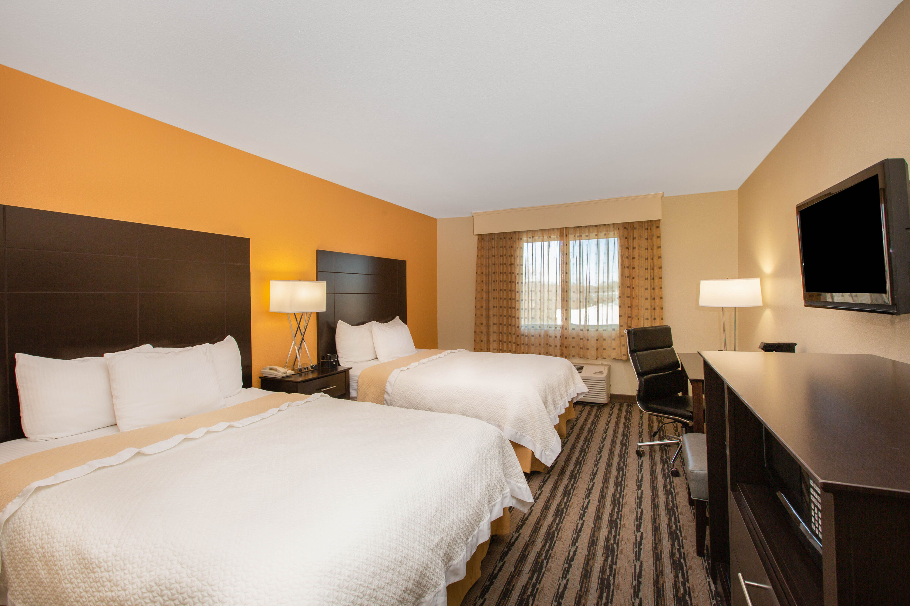 Guest room at the La Quinta Inn by Wyndham Lincoln in Lincoln, Nebraska