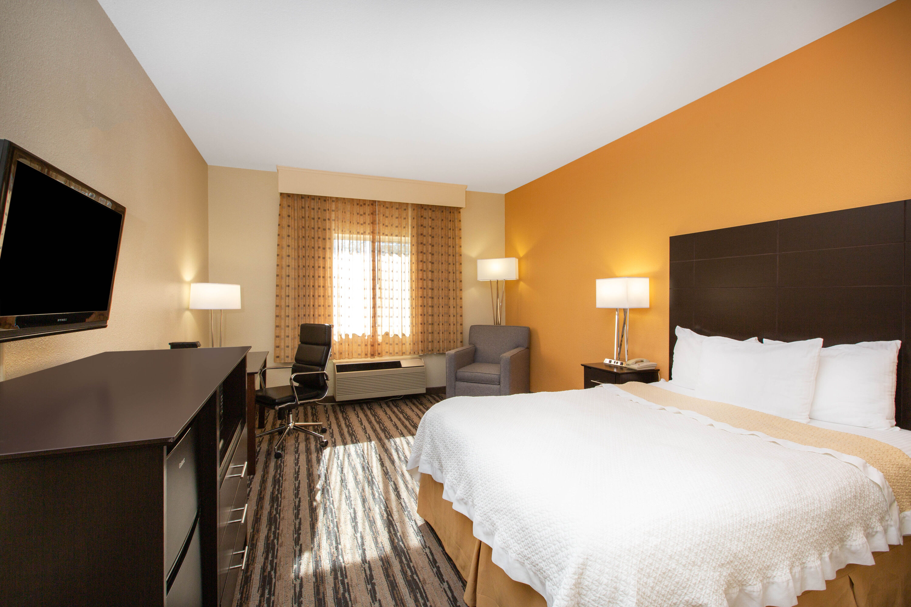 Guest room at the La Quinta Inn by Wyndham Lincoln in Lincoln, Nebraska