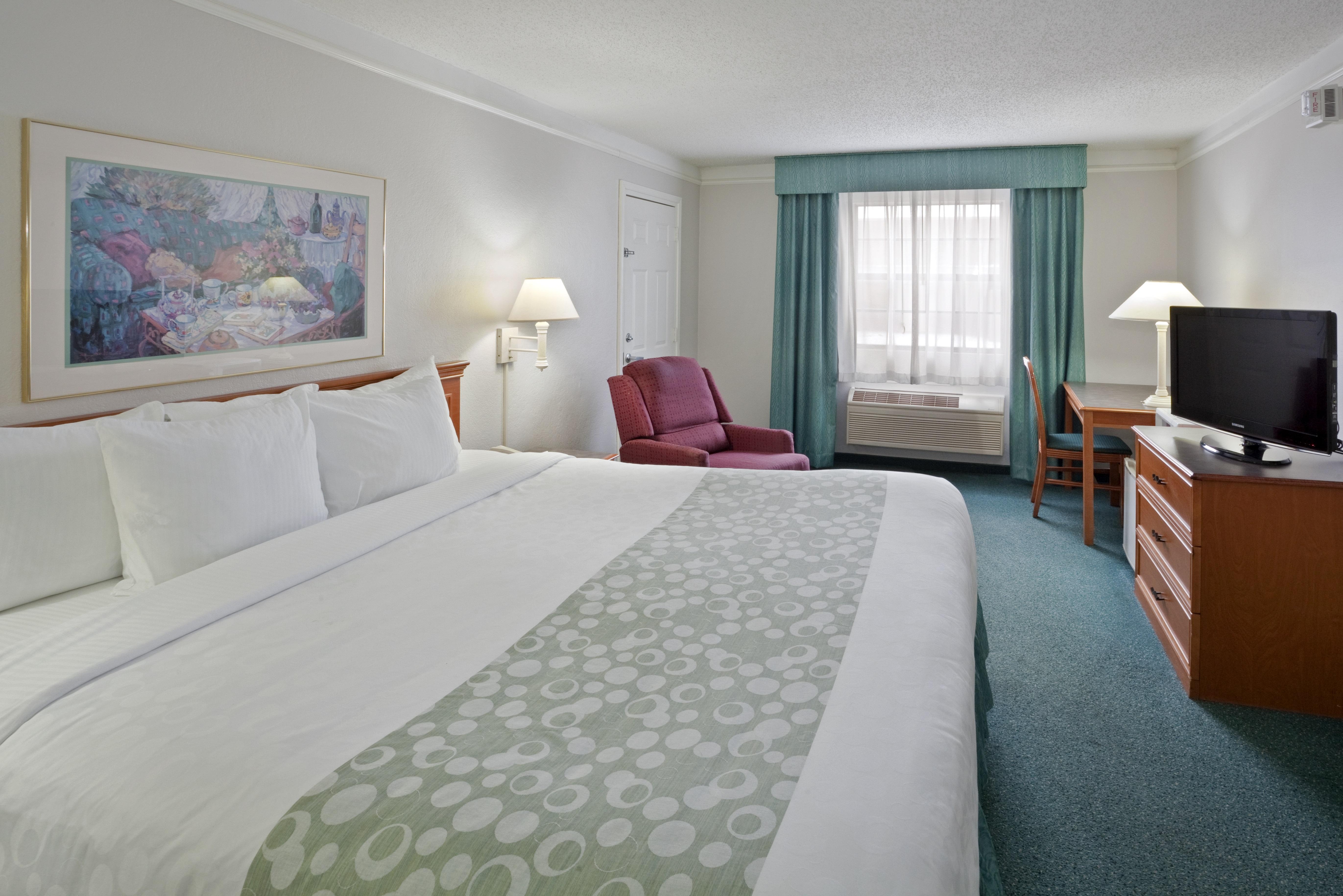 Guest room at the La Quinta Inn by Wyndham Omaha West in Omaha, Nebraska