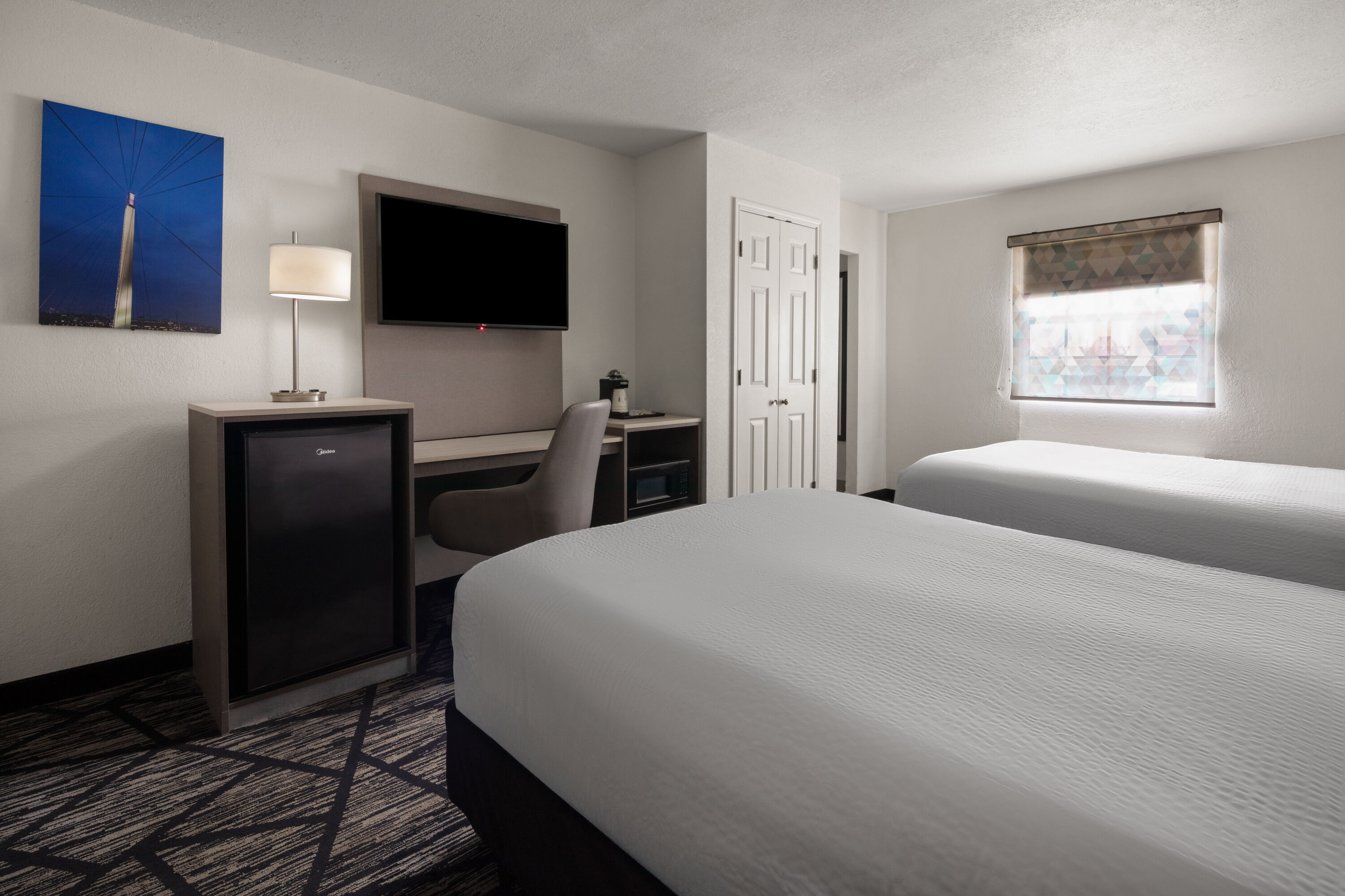 Guest room at the La Quinta Inn by Wyndham Omaha West in Omaha, Nebraska