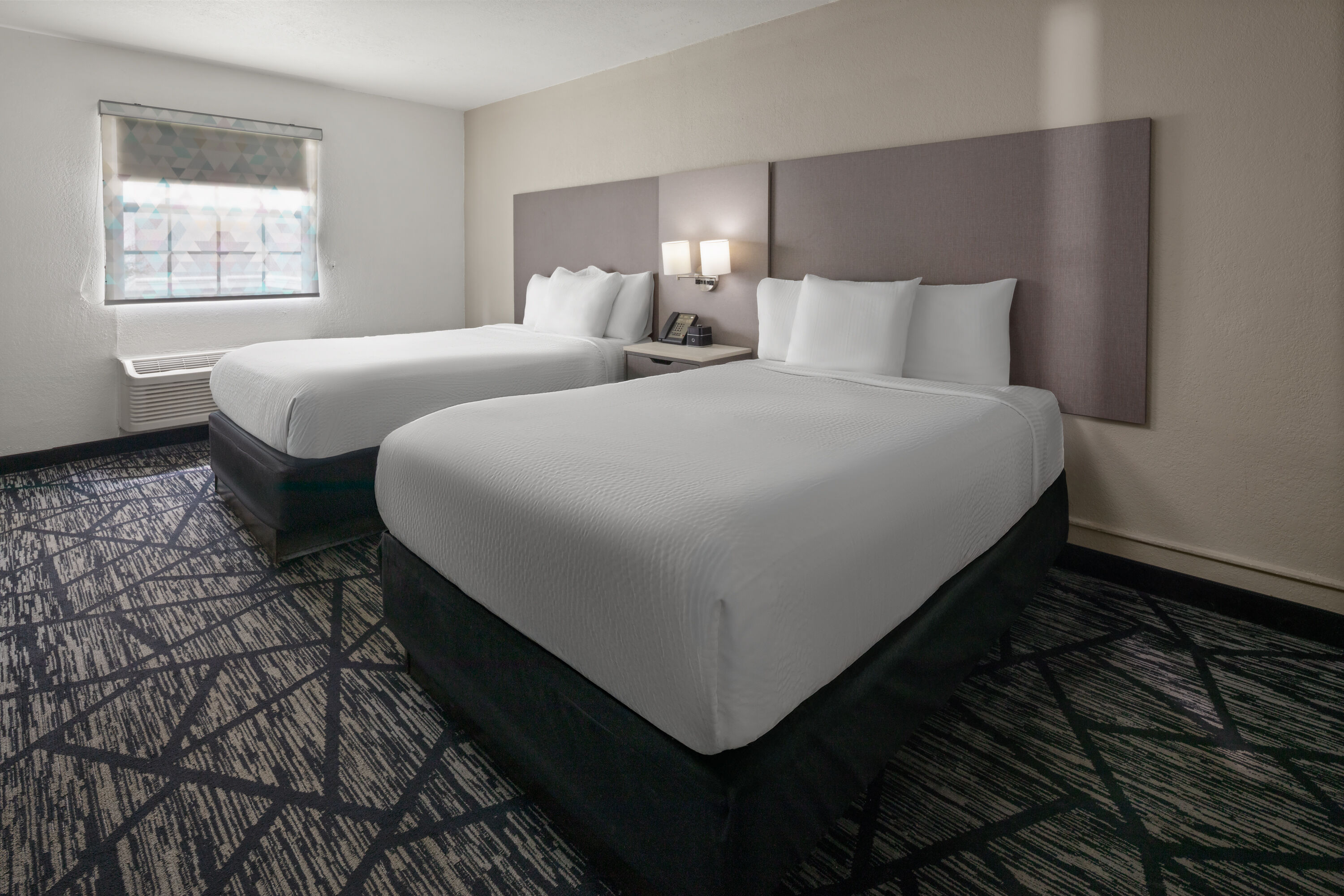 Guest room at the La Quinta Inn by Wyndham Omaha West in Omaha, Nebraska