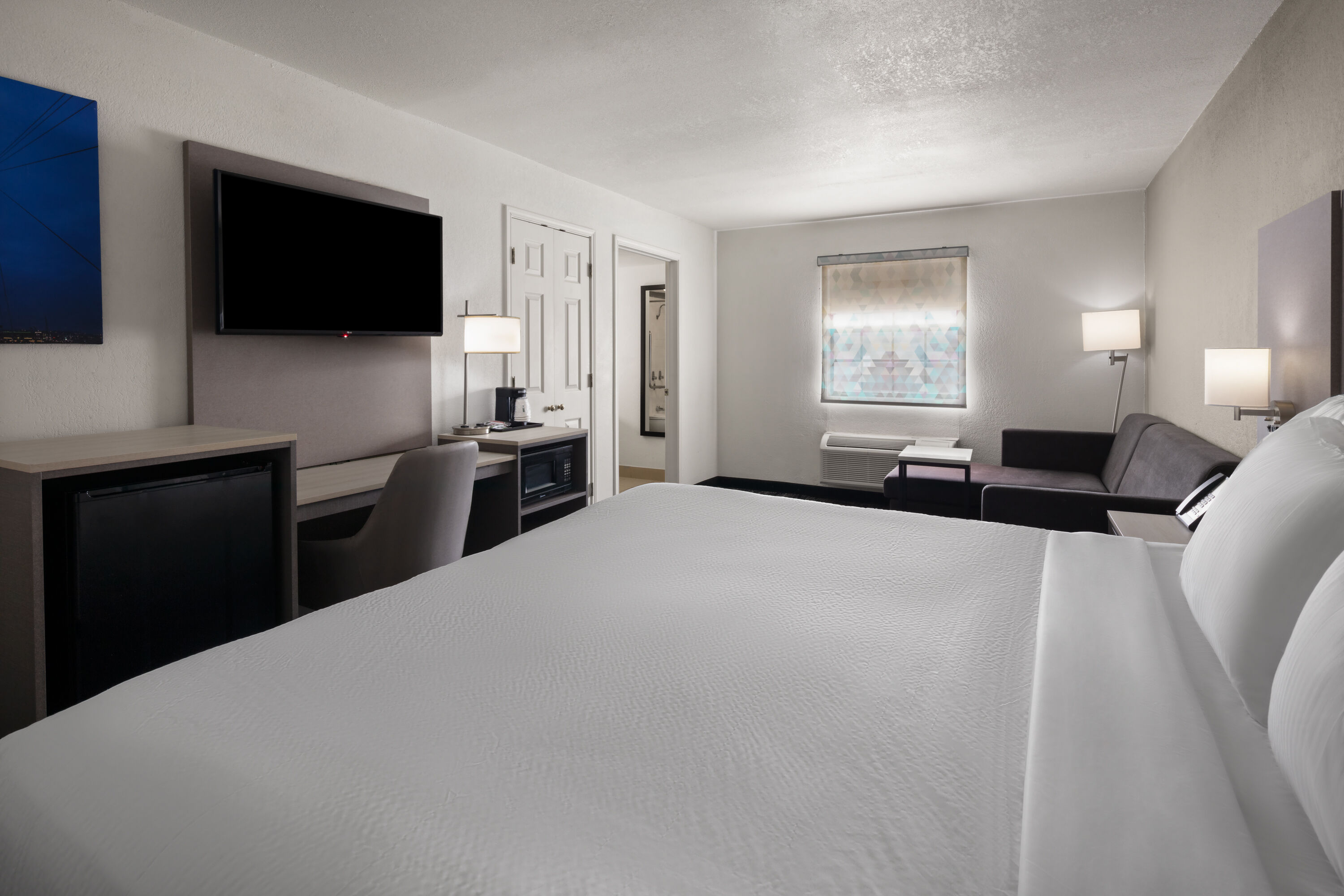 Guest room at the La Quinta Inn by Wyndham Omaha West in Omaha, Nebraska