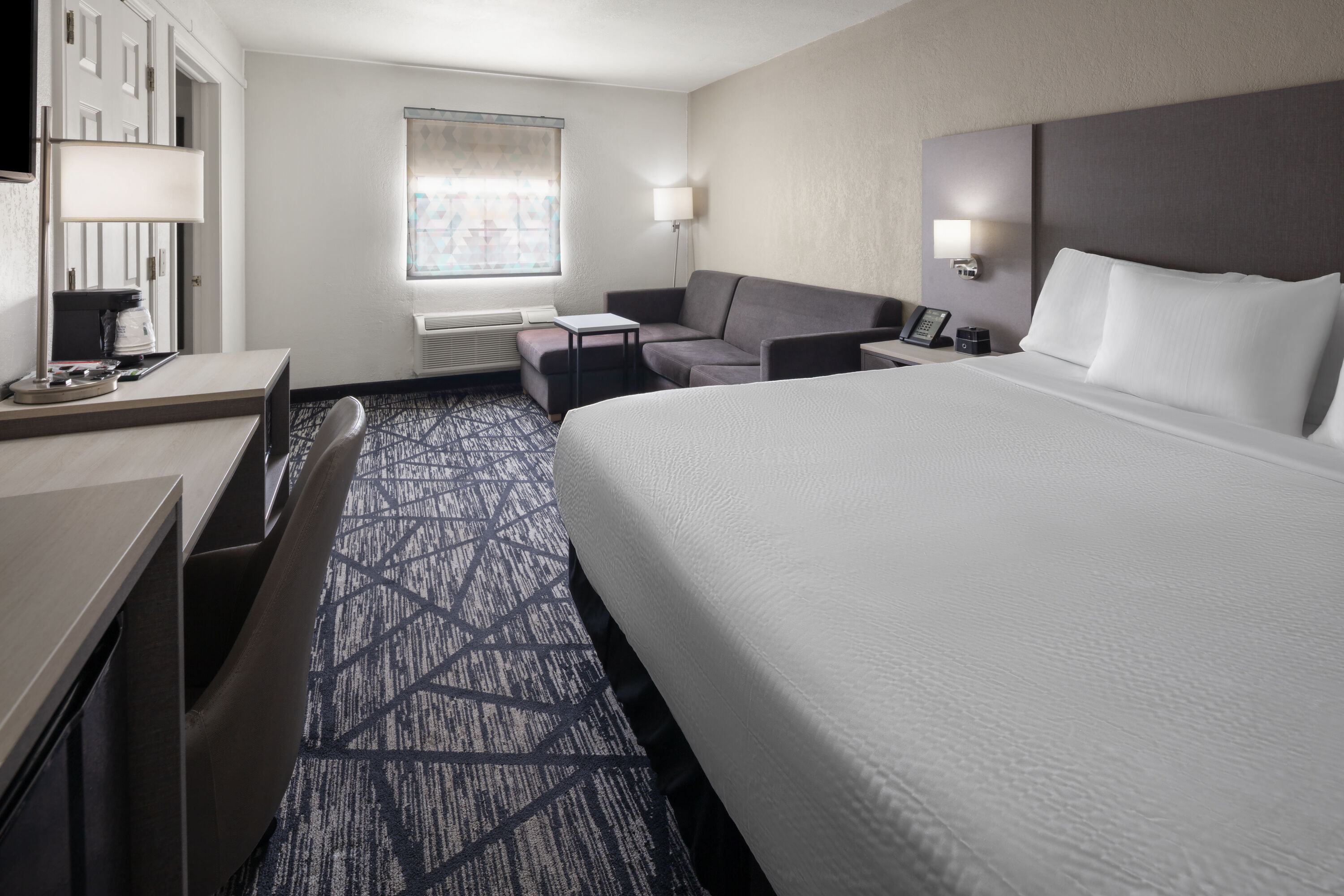 Guest room at the La Quinta Inn by Wyndham Omaha West in Omaha, Nebraska