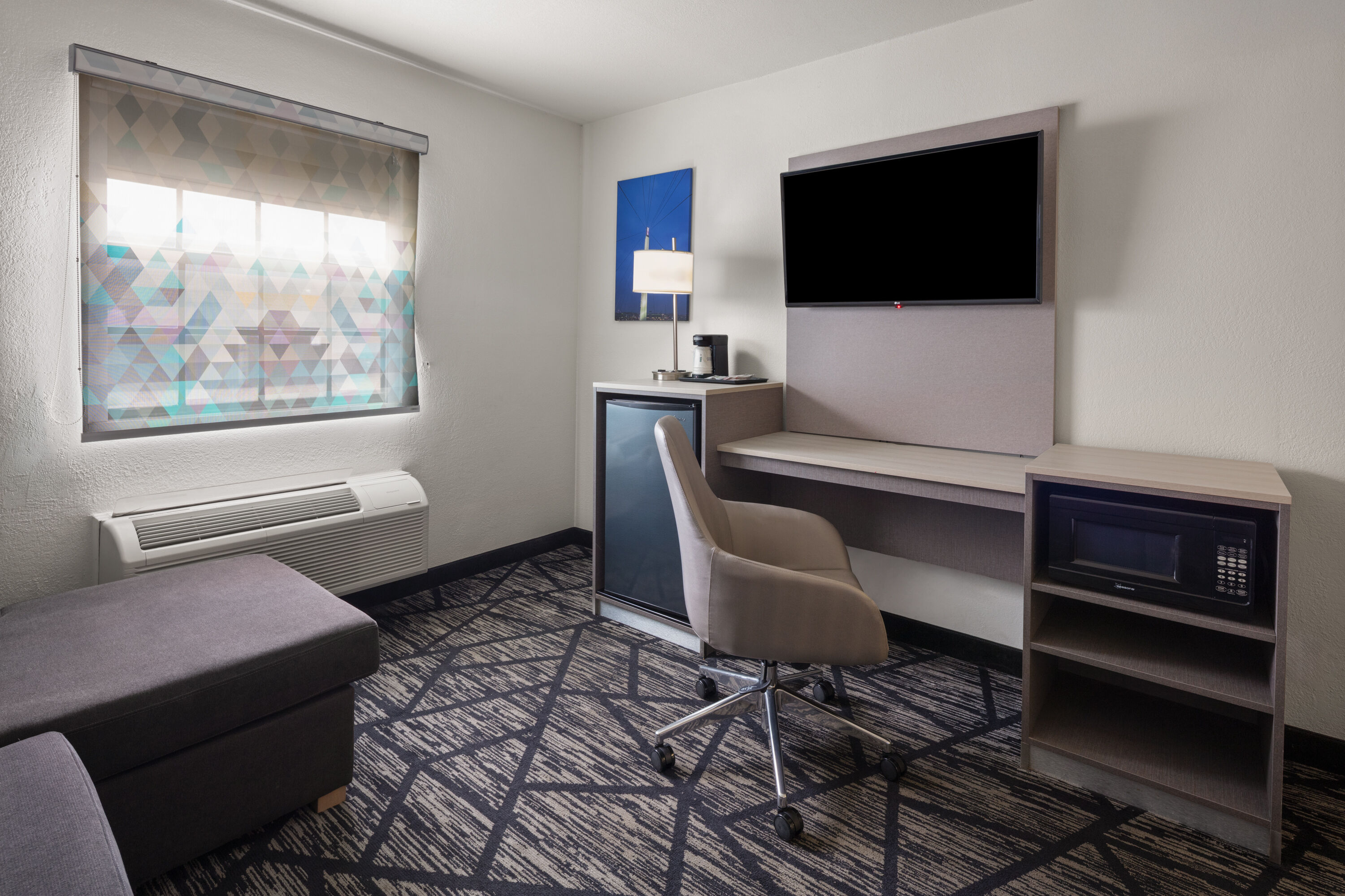 Guest room at the La Quinta Inn by Wyndham Omaha West in Omaha, Nebraska
