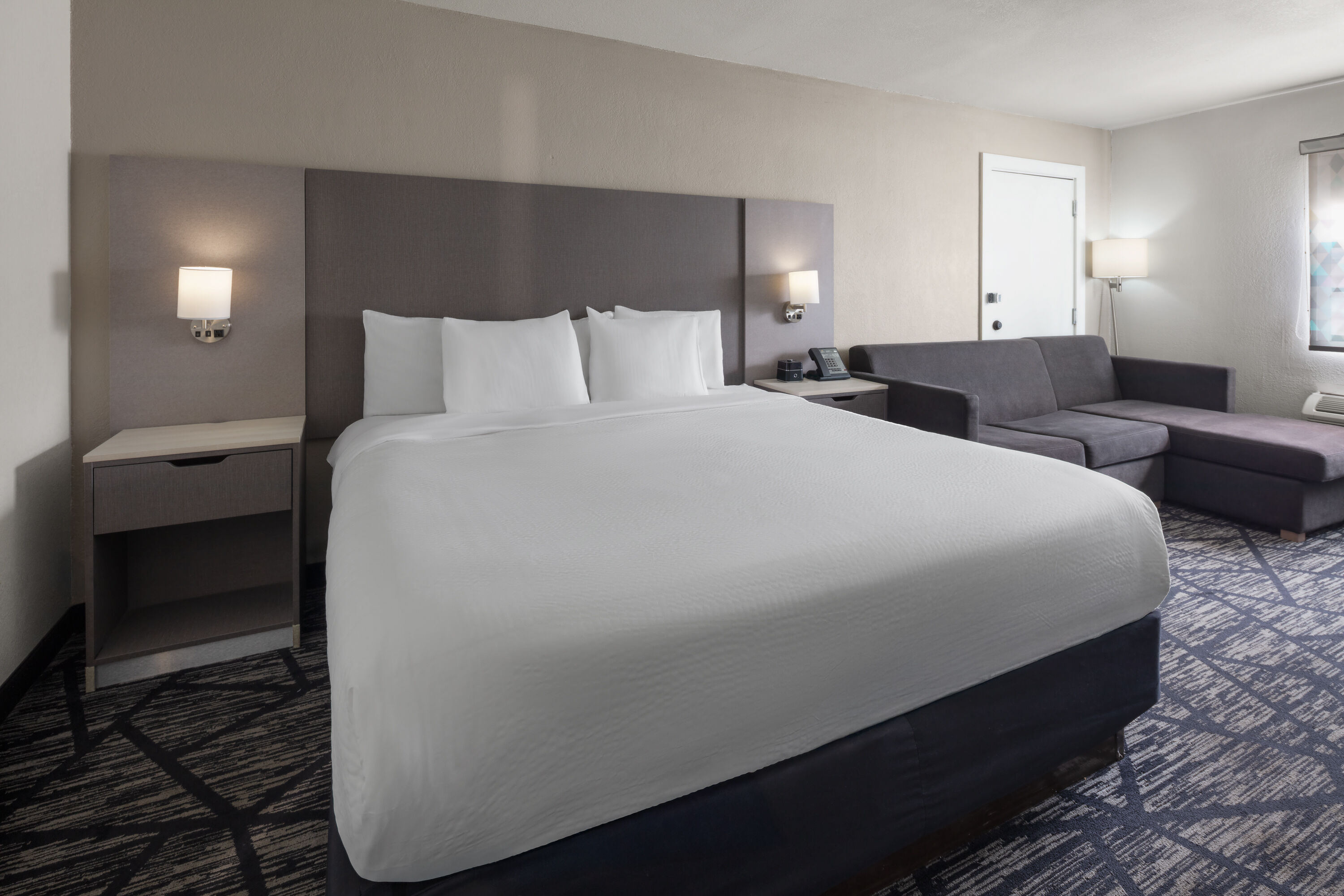 Guest room at the La Quinta Inn by Wyndham Omaha West in Omaha, Nebraska