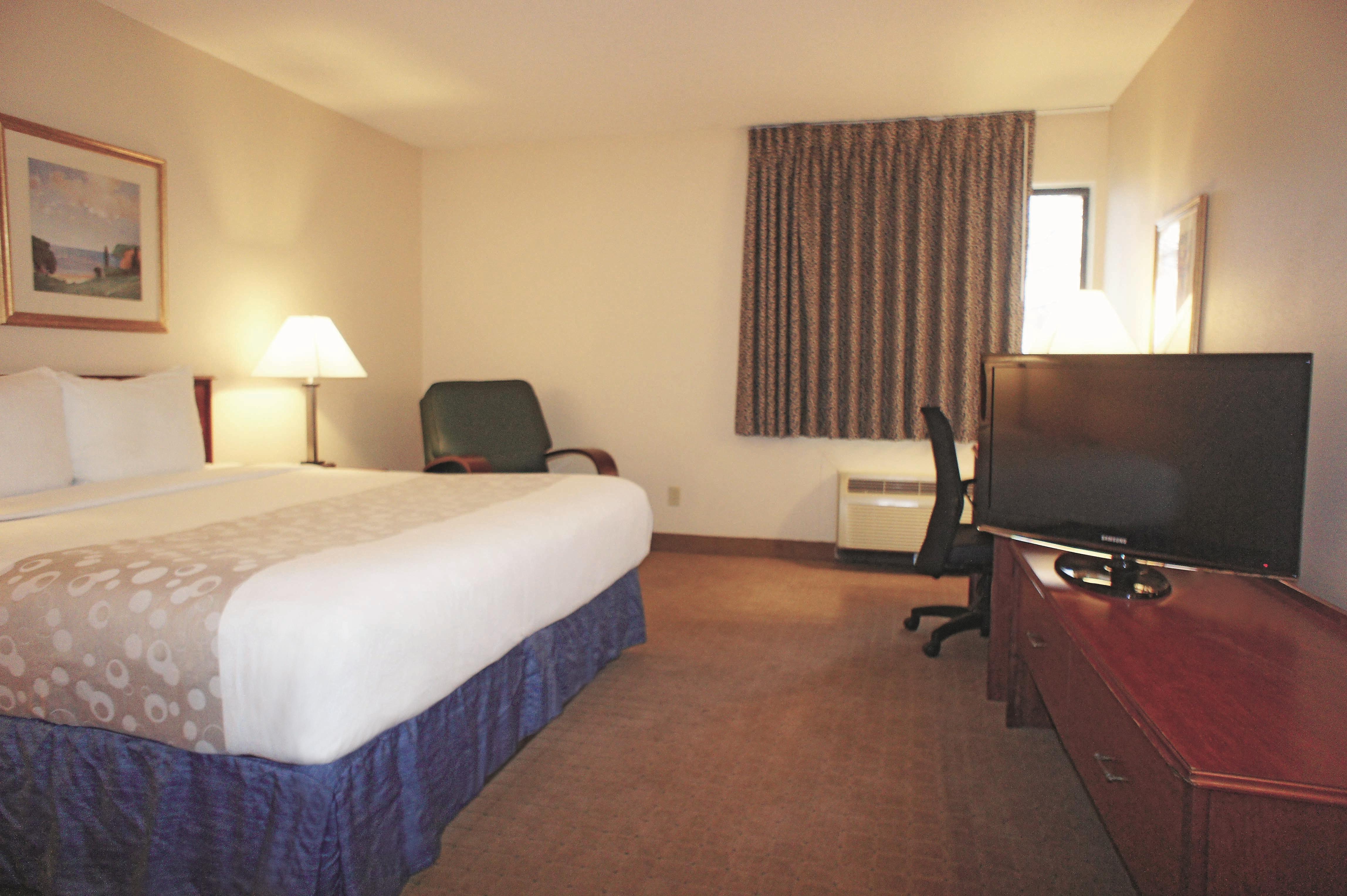 Guest room at the La Quinta Inn by Wyndham Omaha Southwest in Omaha, Nebraska