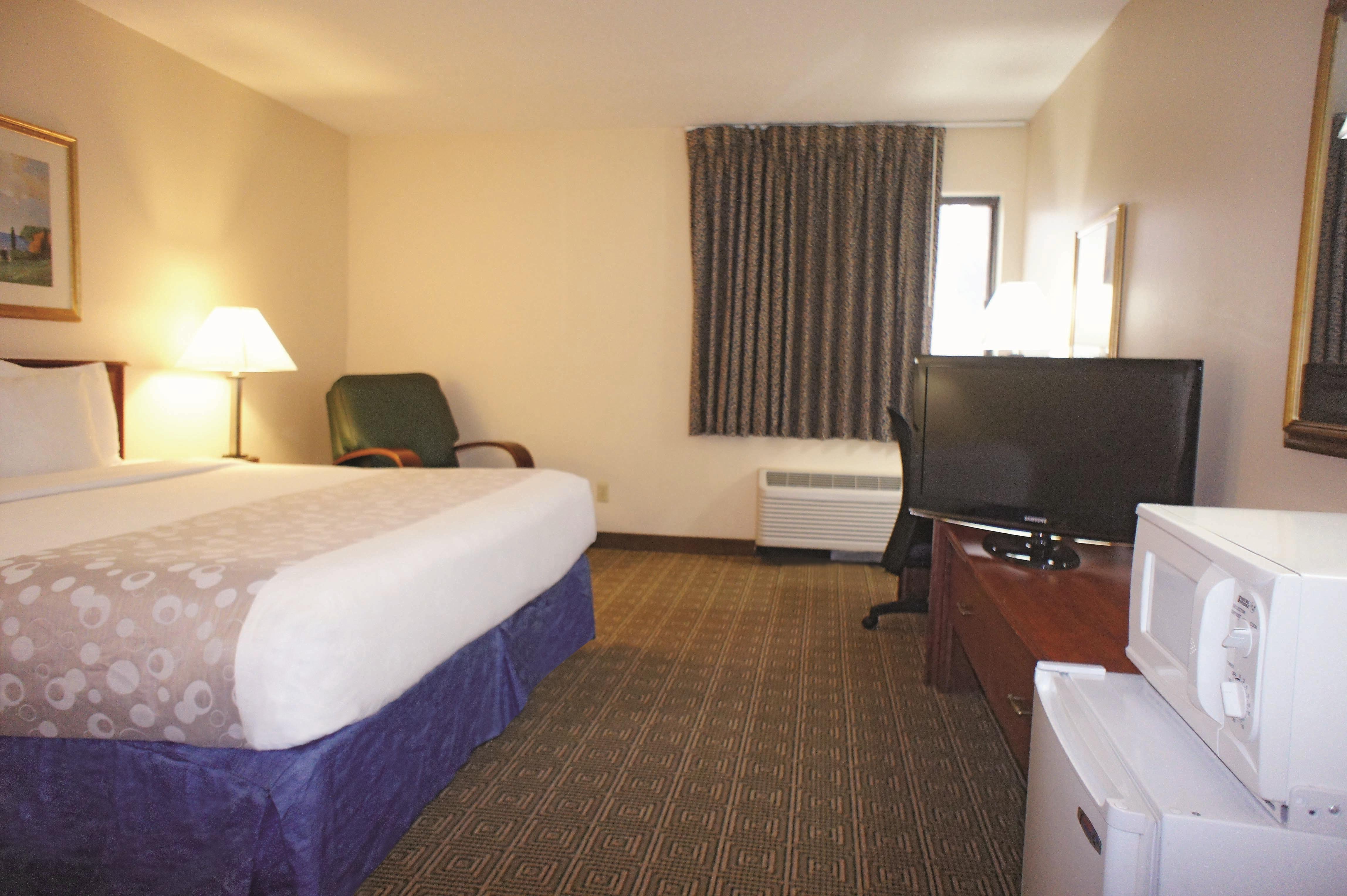Guest room at the La Quinta Inn by Wyndham Omaha Southwest in Omaha, Nebraska