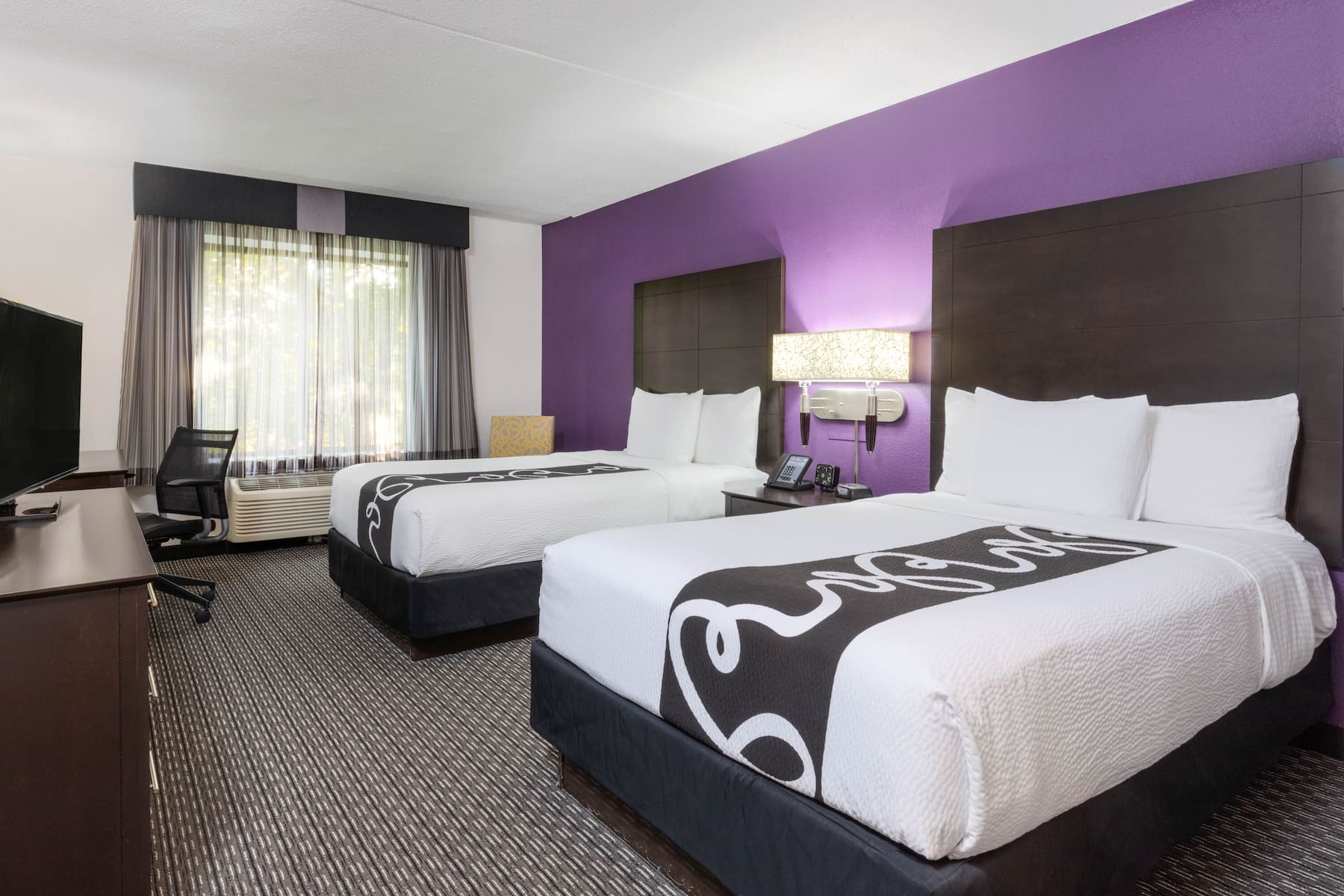 Guest room at the La Quinta Inn & Suites by Wyndham Clifton/Rutherford in Clifton, New Jersey