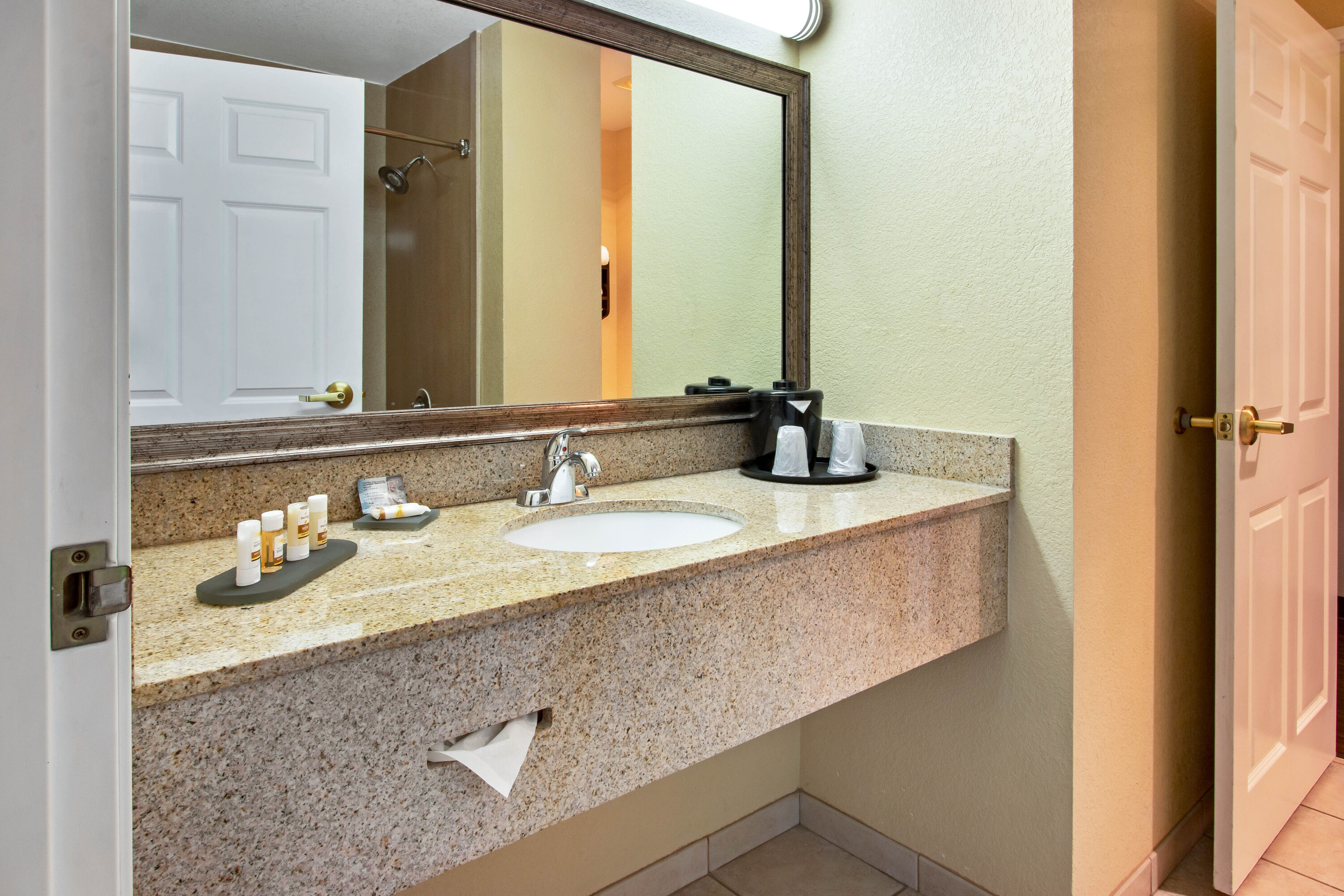 Guest room bath at the La Quinta Inn & Suites by Wyndham Albuquerque Midtown in Albuquerque, New Mexico