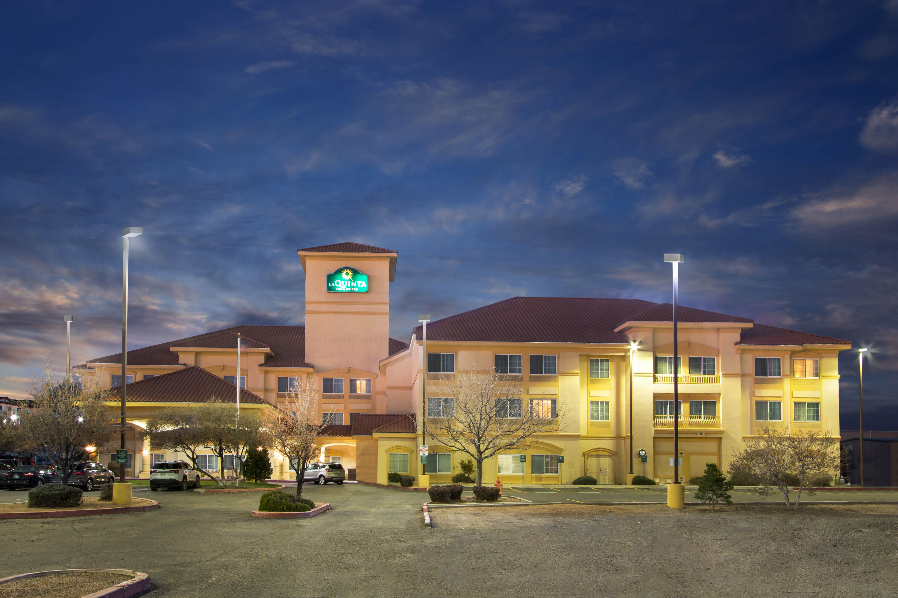 Exterior Dusk Image of La Quinta Inn & Suites by Wyndham Albuquerque Midtown hotel in Albuquerque, New Mexico
