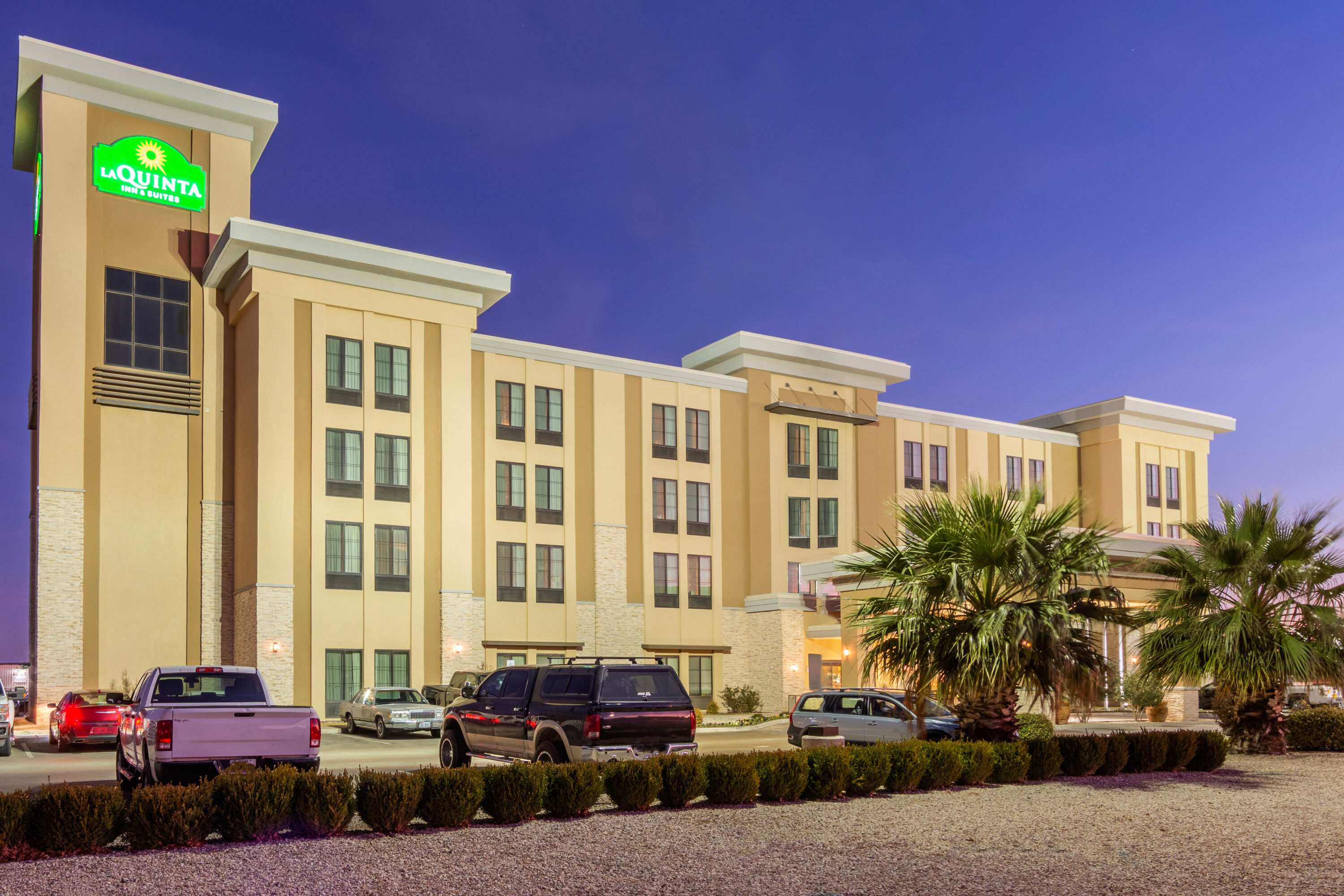 Exterior Dusk Image of La Quinta Inn & Suites by Wyndham Carlsbad hotel in Carlsbad, New Mexico