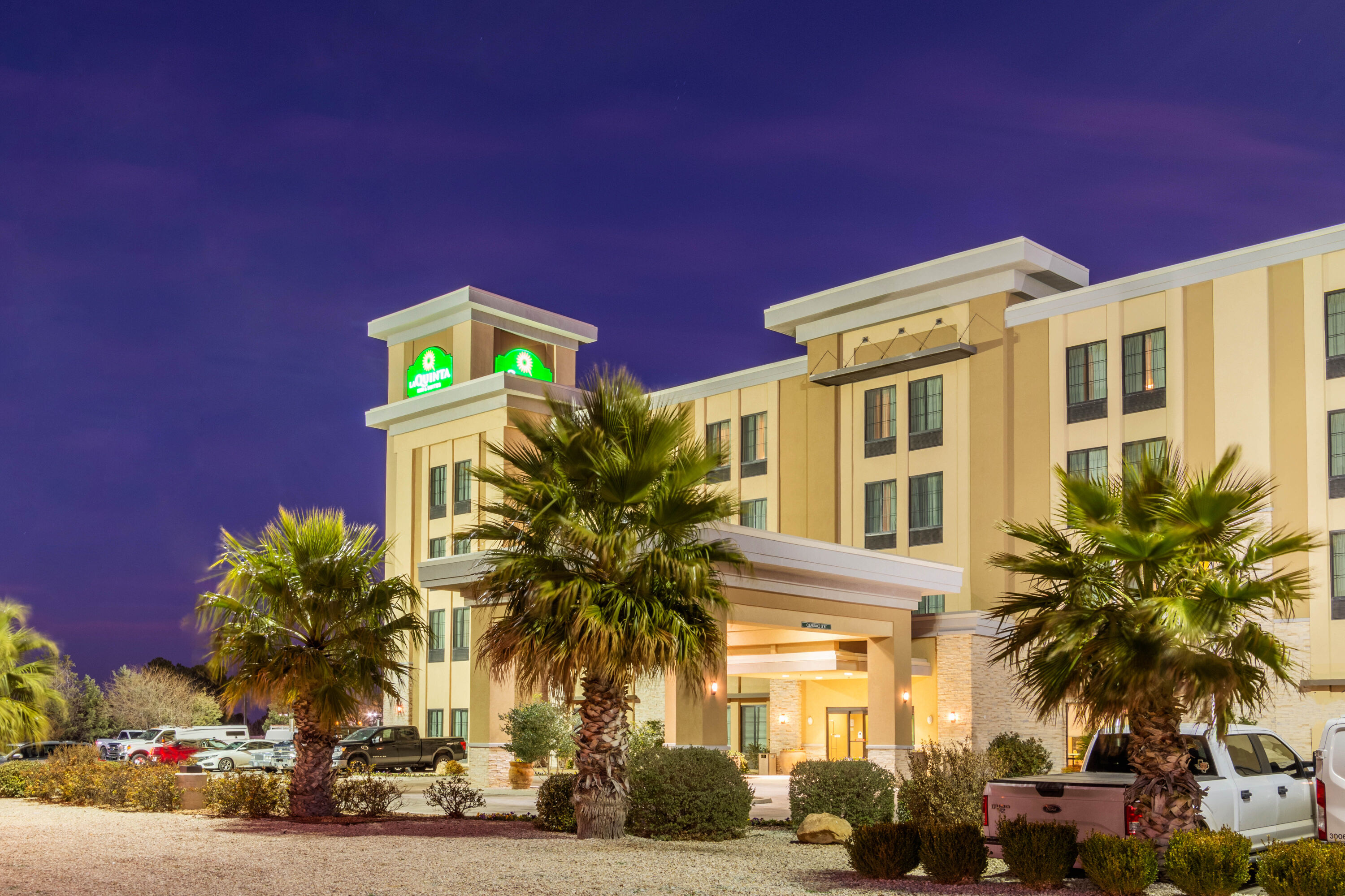 Exterior Dusk Image of La Quinta Inn & Suites by Wyndham Carlsbad hotel in Carlsbad, New Mexico