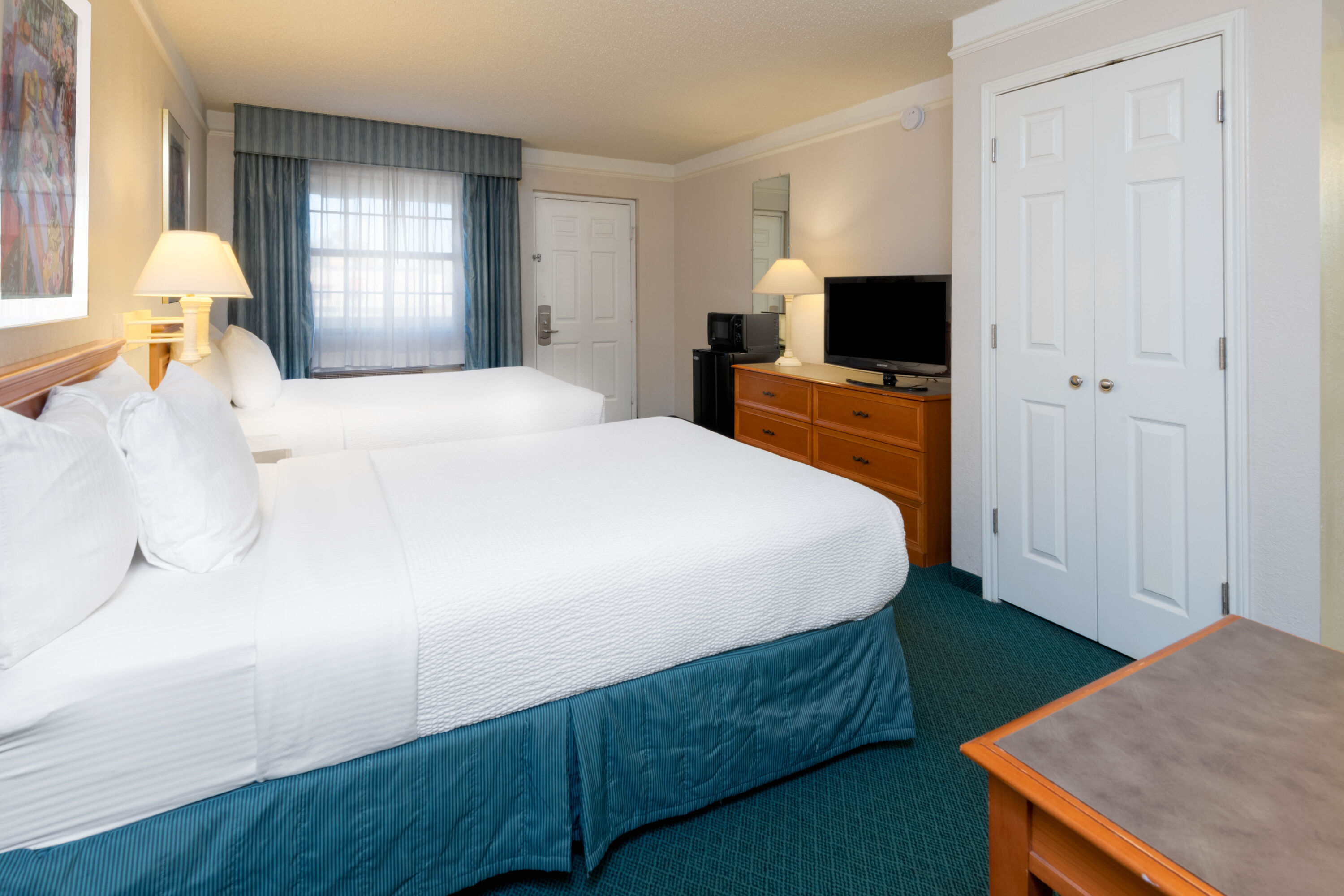 Guest room at the La Quinta Inn by Wyndham Farmington in Farmington, New Mexico