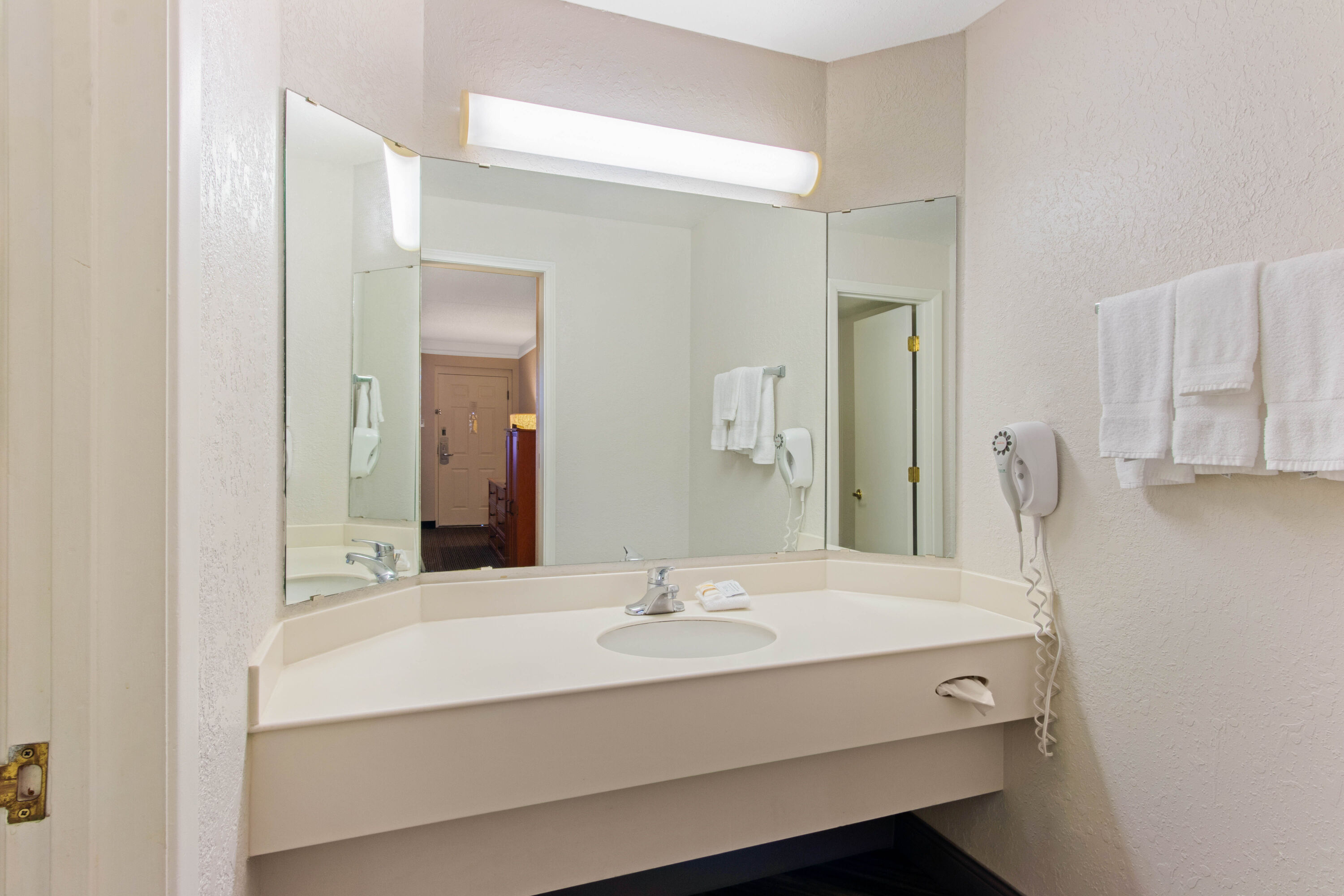 Guest room bath at the La Quinta Inn by Wyndham Santa Fe in Santa Fe, New Mexico