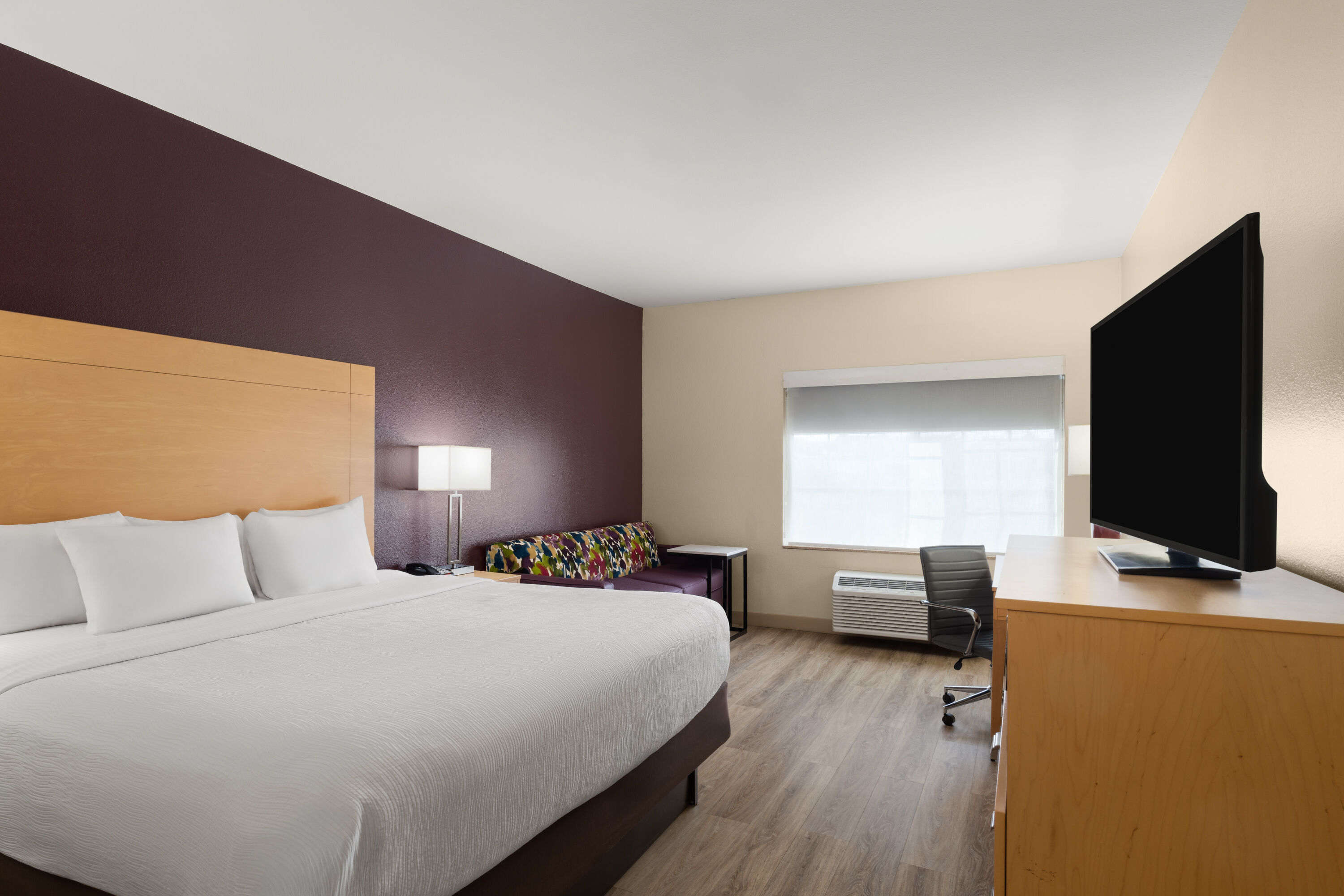 Guest room at the La Quinta Inn & Suites by Wyndham Tucumcari in Tucumcari, New Mexico