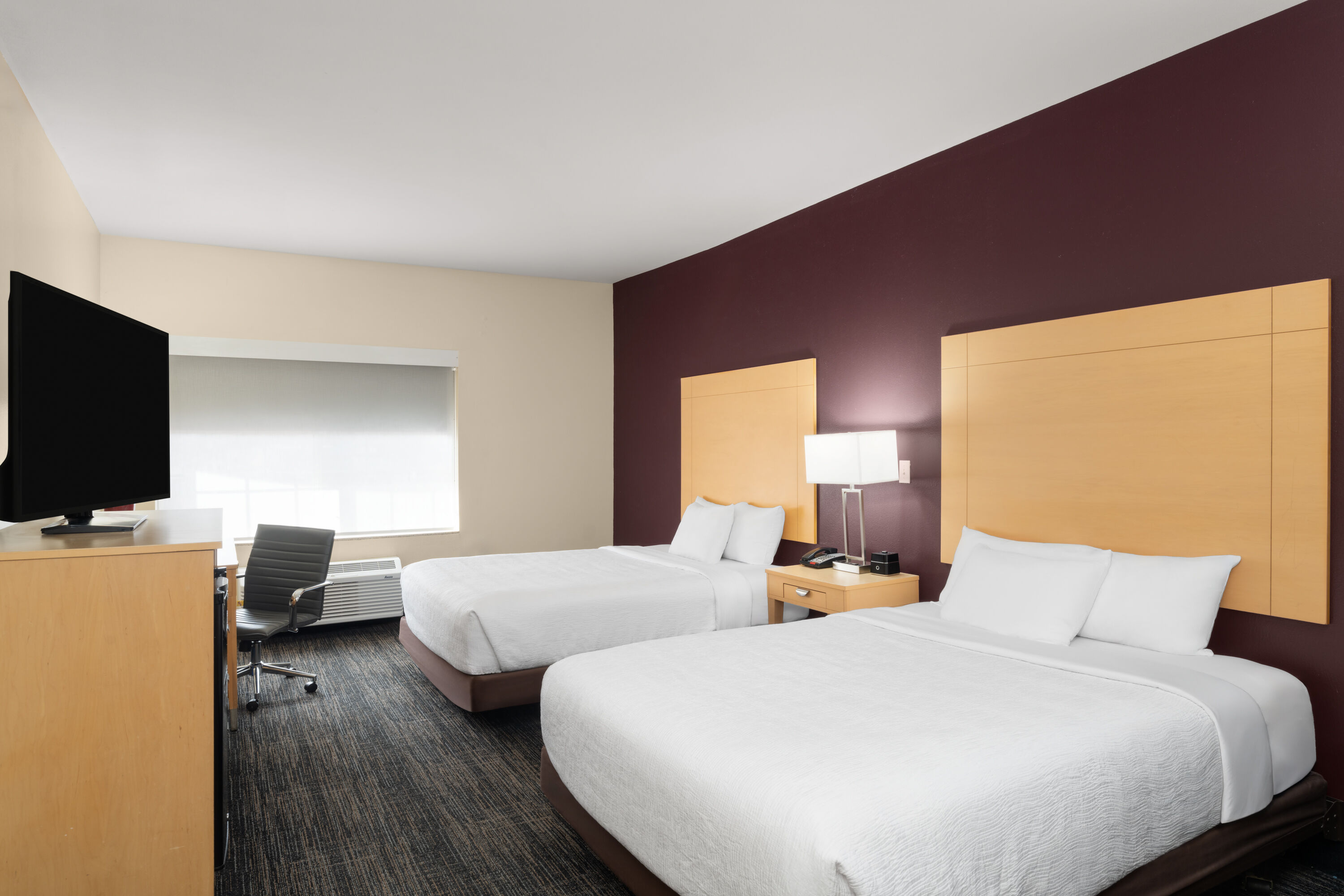 Guest room at the La Quinta Inn & Suites by Wyndham Tucumcari in Tucumcari, New Mexico