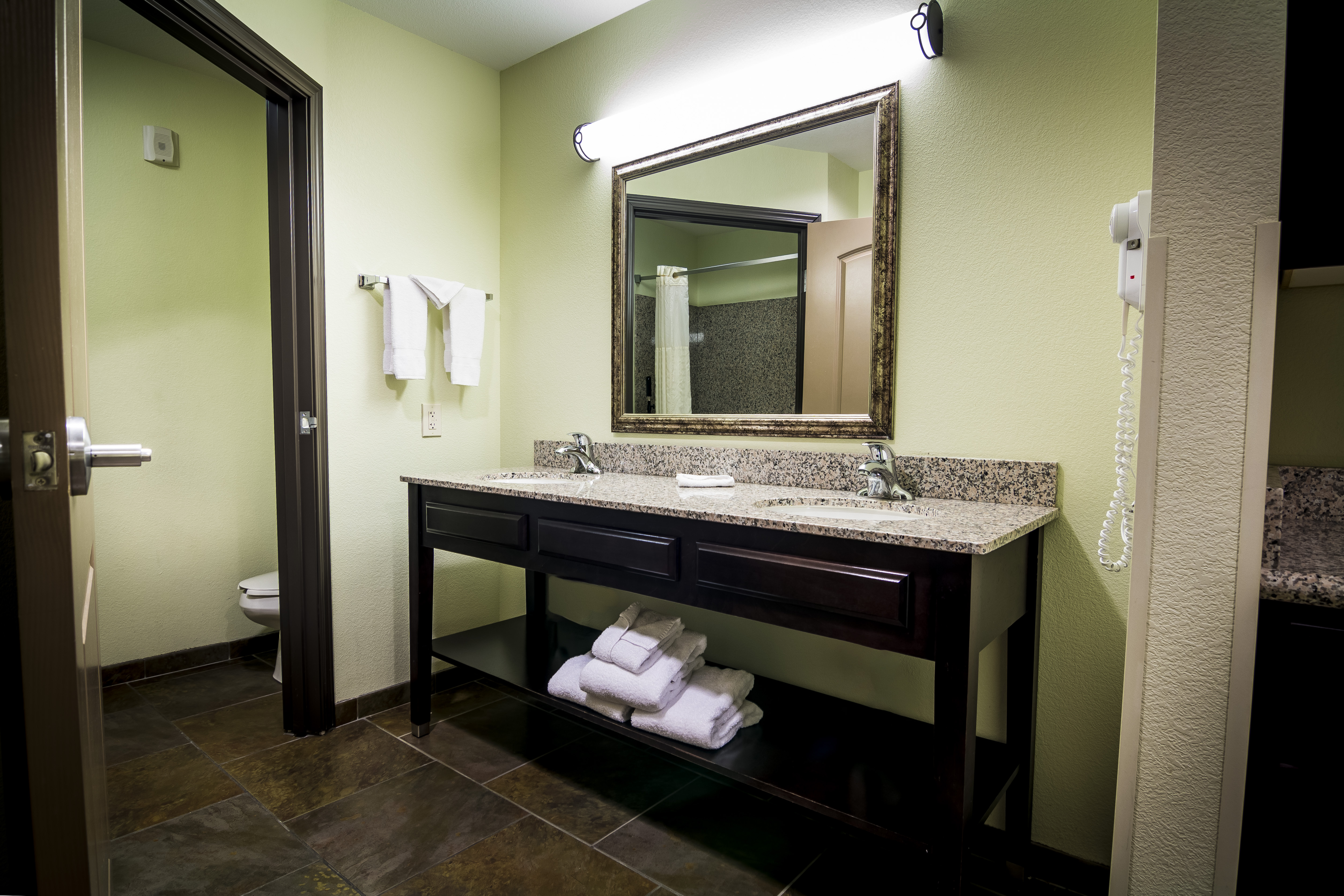 Guest room bath at the La Quinta Inn & Suites by Wyndham Las Vegas Airport South in Las Vegas, Nevada