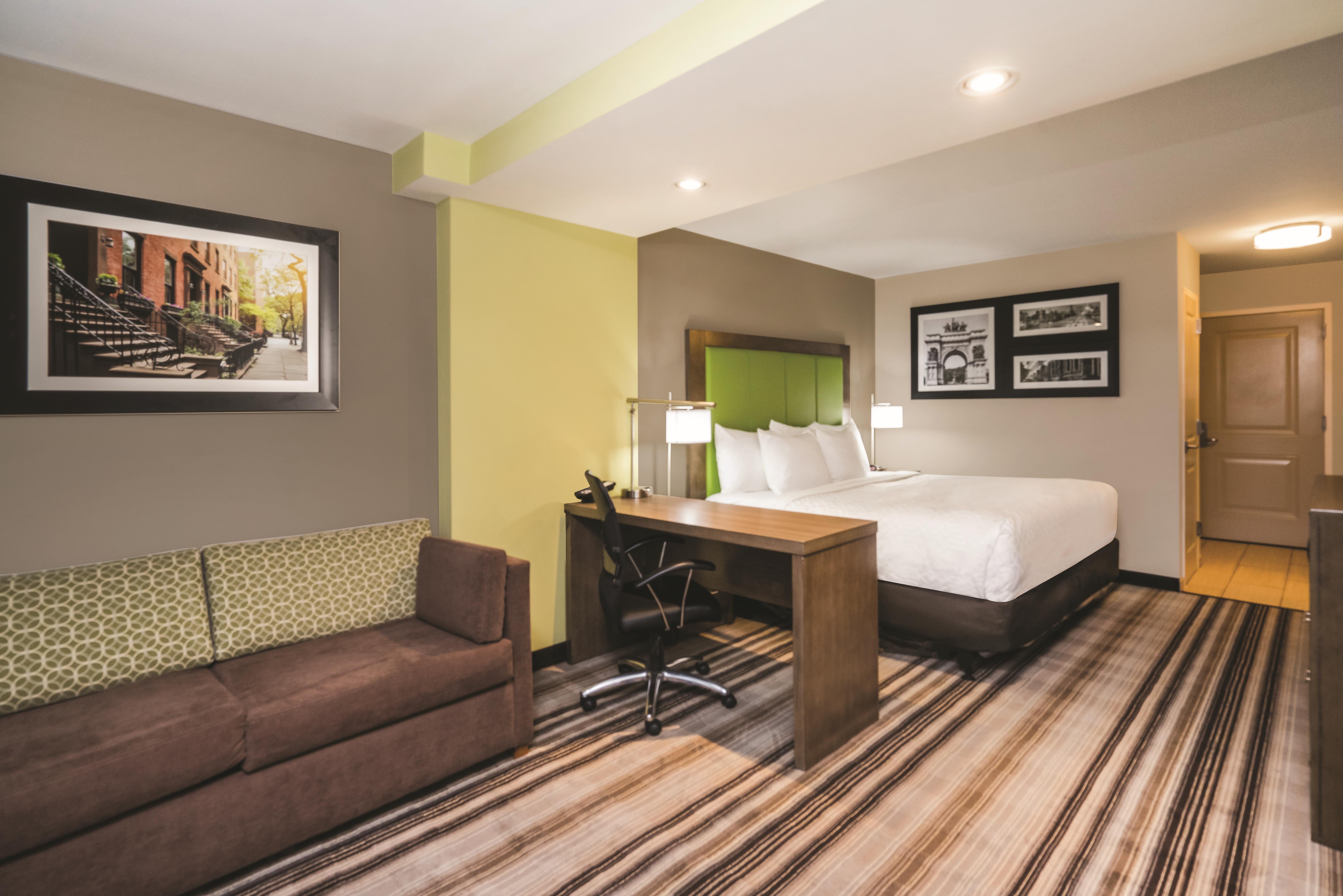 Guest room at the La Quinta Inn & Suites by Wyndham Brooklyn Central in Brooklyn, New York