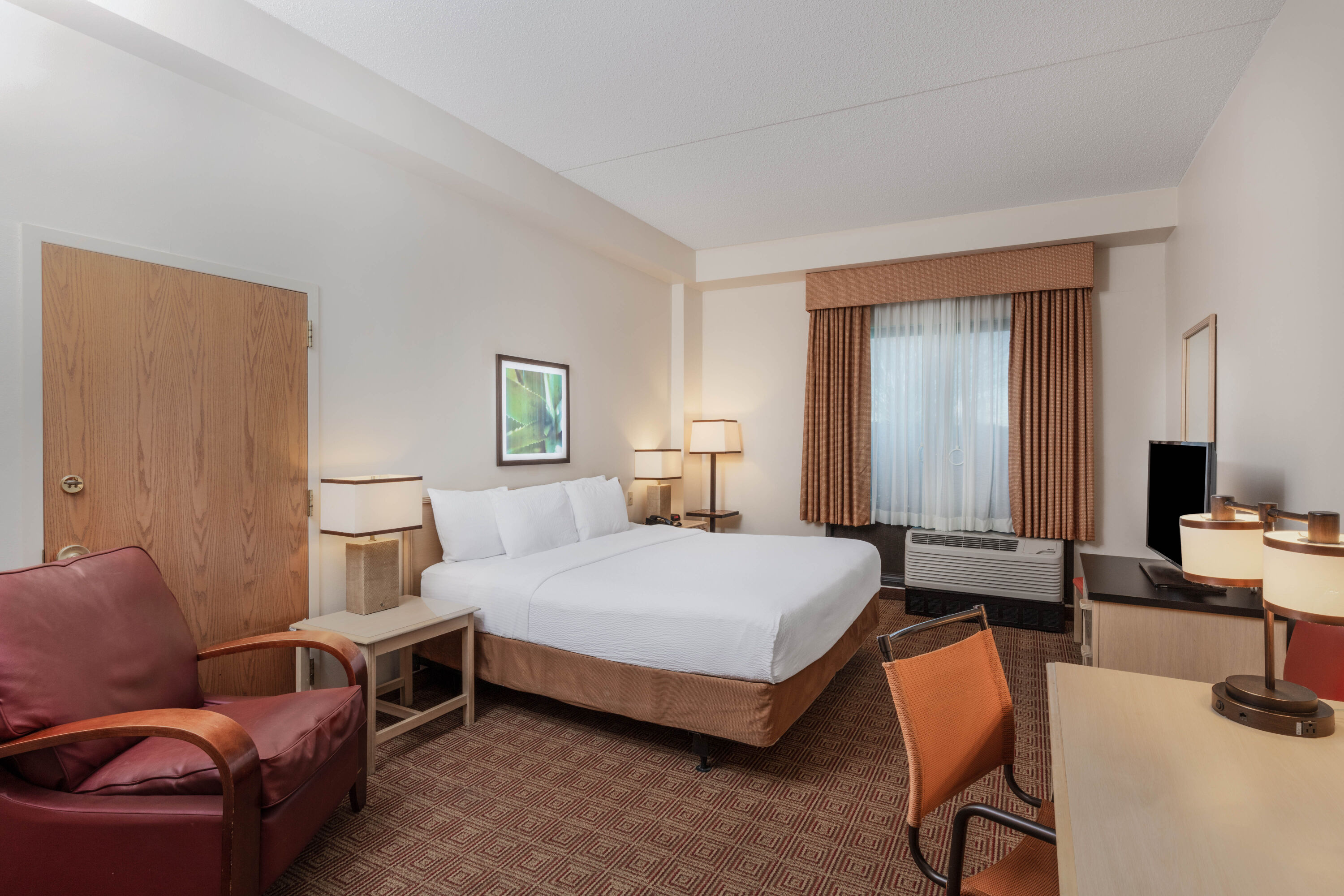 Guest room at the La Quinta Inn & Suites by Wyndham Garden City in Garden City, New York
