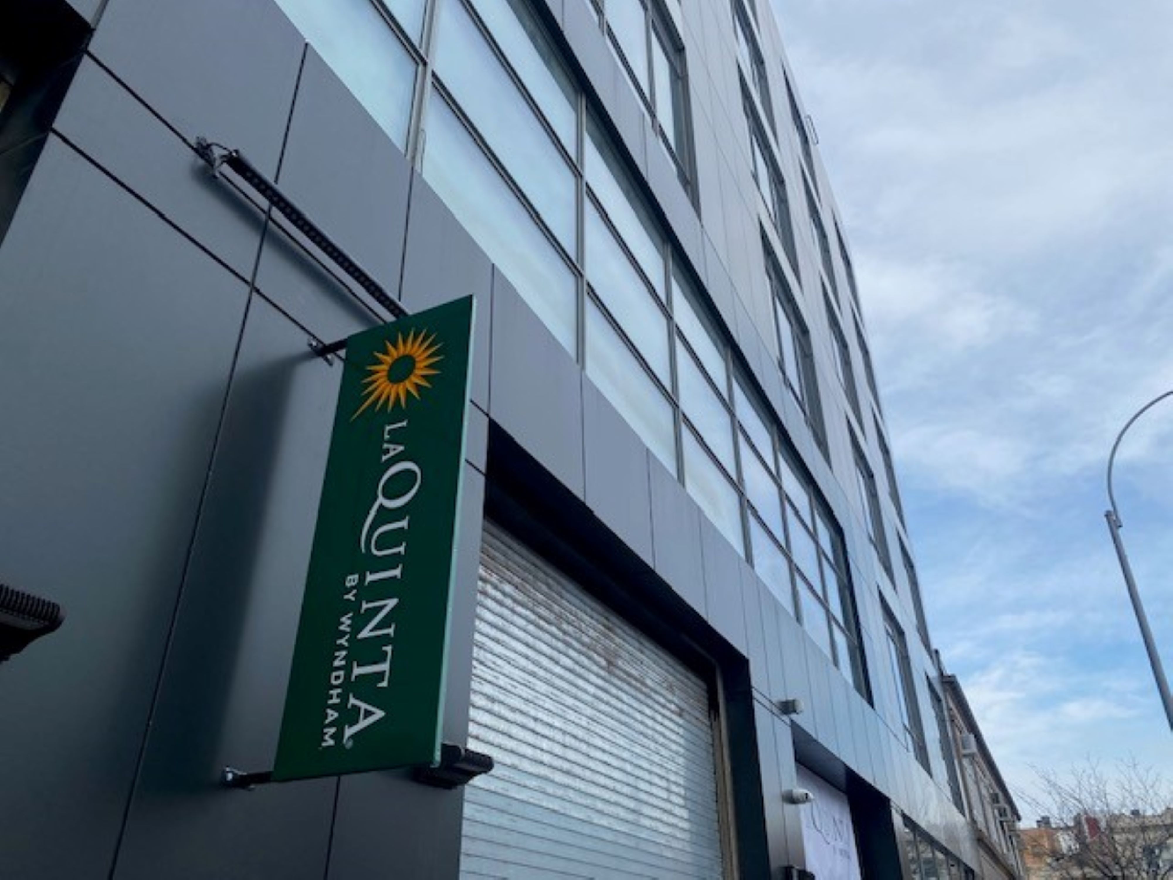 Exterior of La Quinta Inn & Suites by Wyndham Jamaica NYC/JFK AirTrain hotel in Jamaica, New York