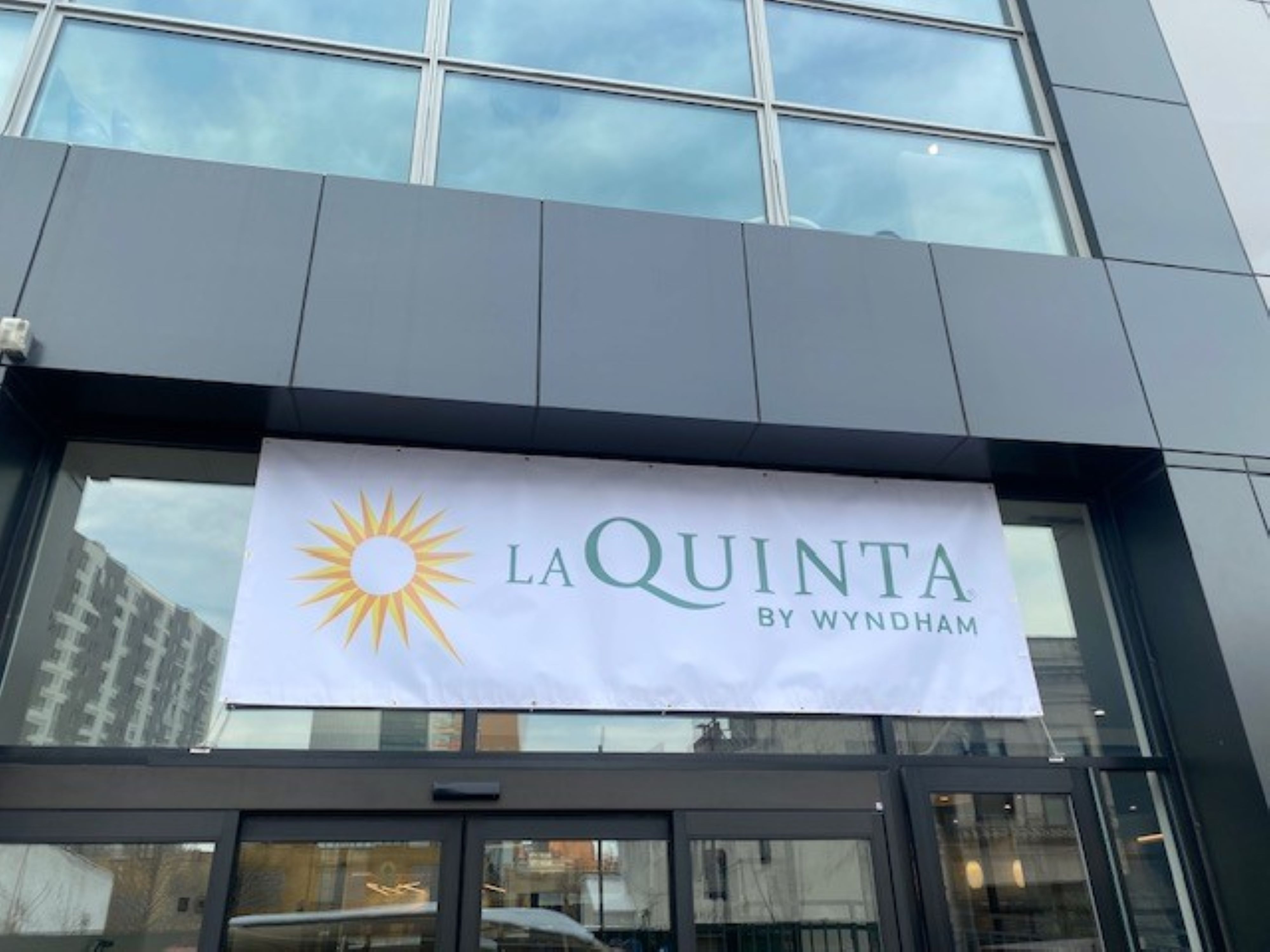 Exterior of La Quinta Inn & Suites by Wyndham Jamaica NYC/JFK AirTrain hotel in Jamaica, New York