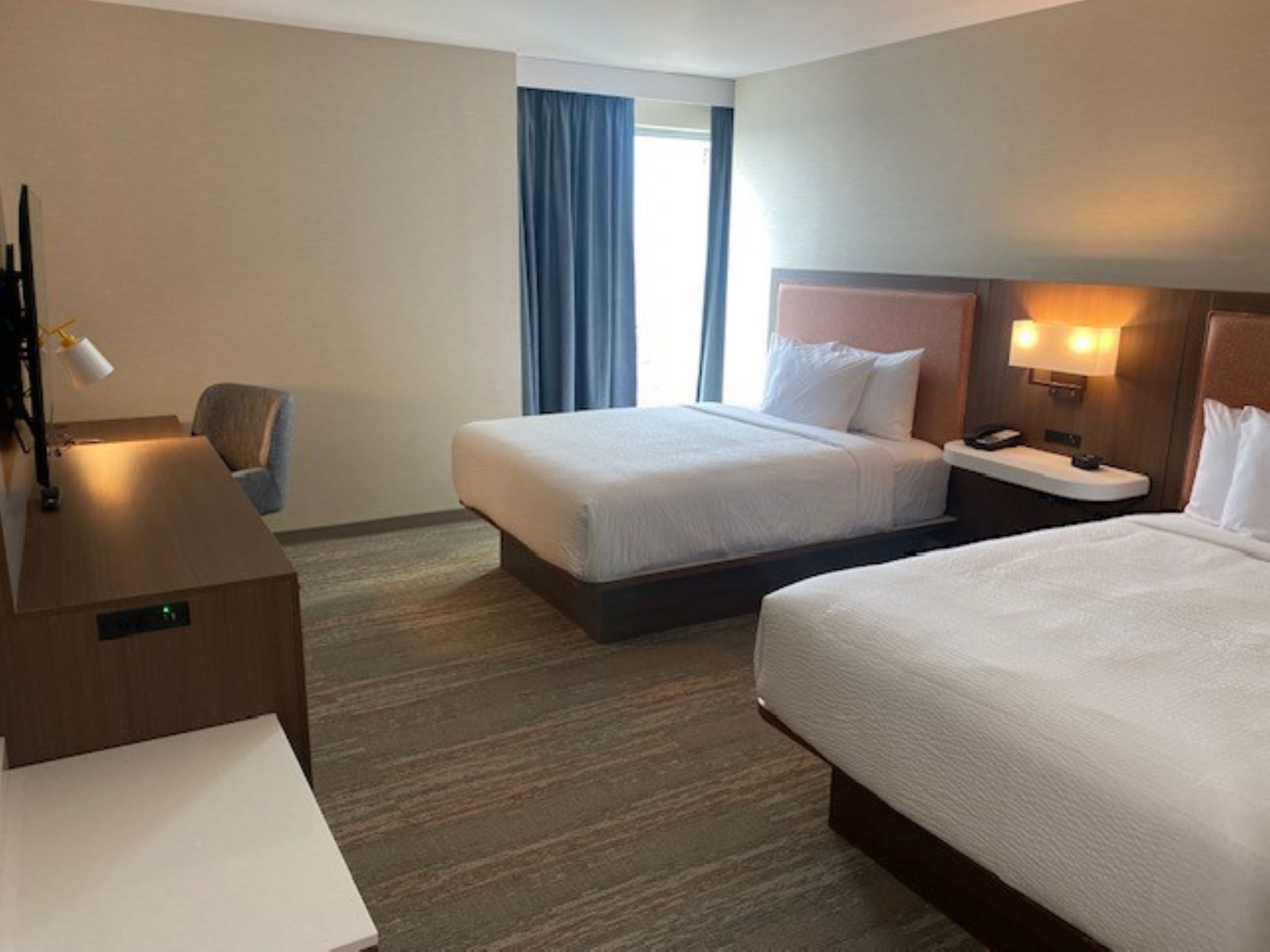 Guest room at the La Quinta Inn & Suites by Wyndham Jamaica NYC/JFK AirTrain in Jamaica, New York
