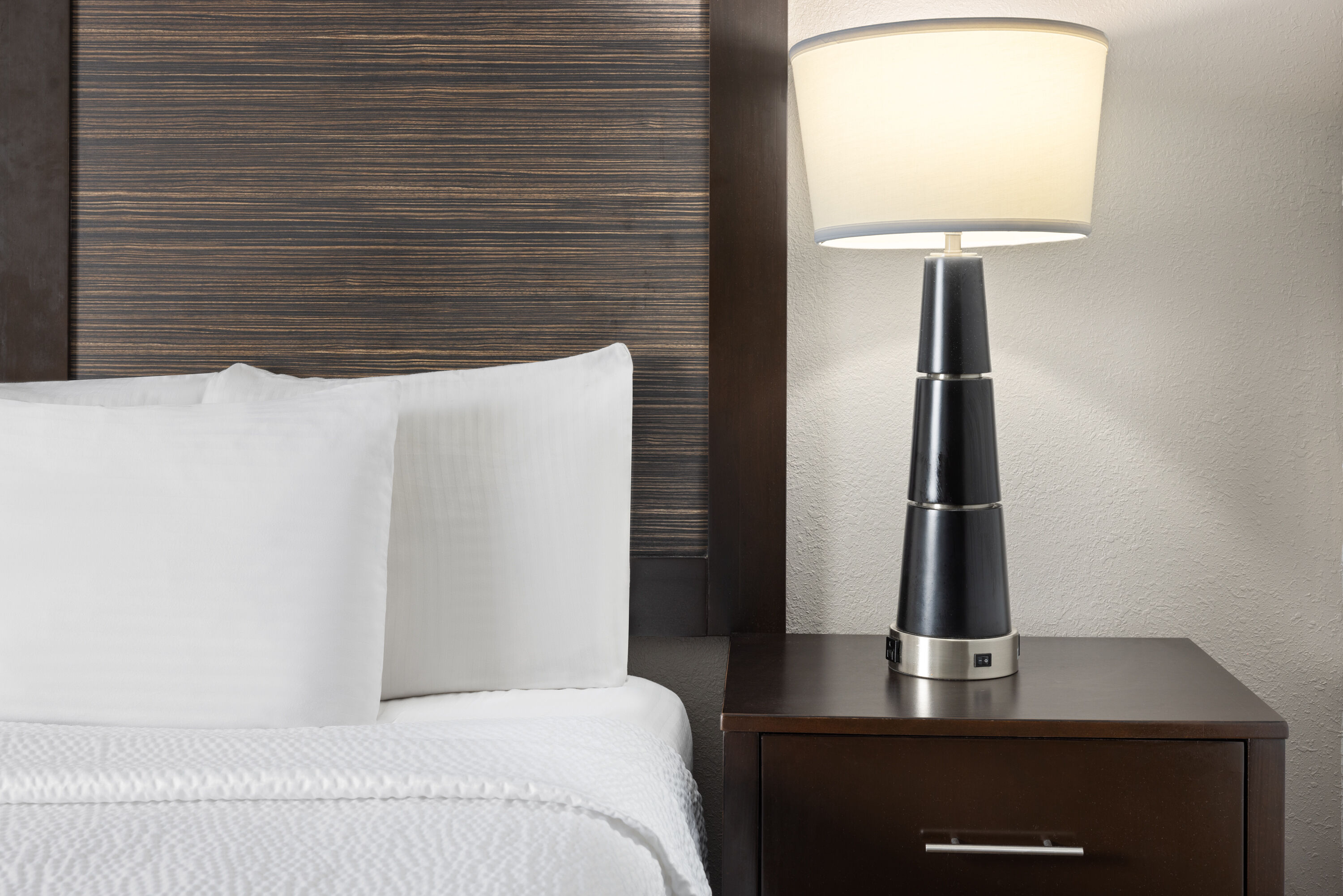 Guest room at the La Quinta Inn by Wyndham Buffalo Airport in Williamsville, New York