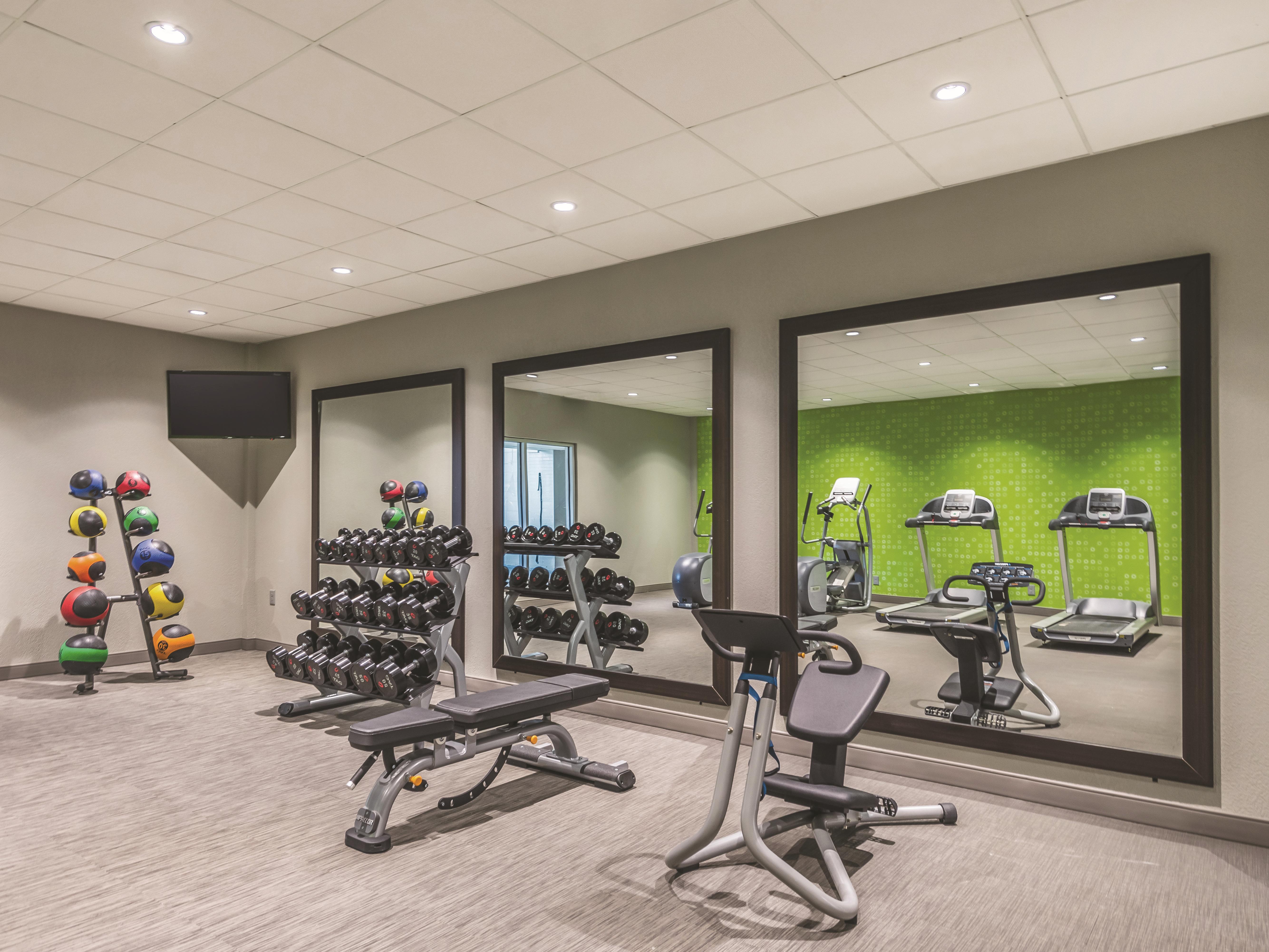 Fitness room at La Quinta Inn & Suites by Wyndham Cincinnati Sharonville in Cincinnati, Ohio