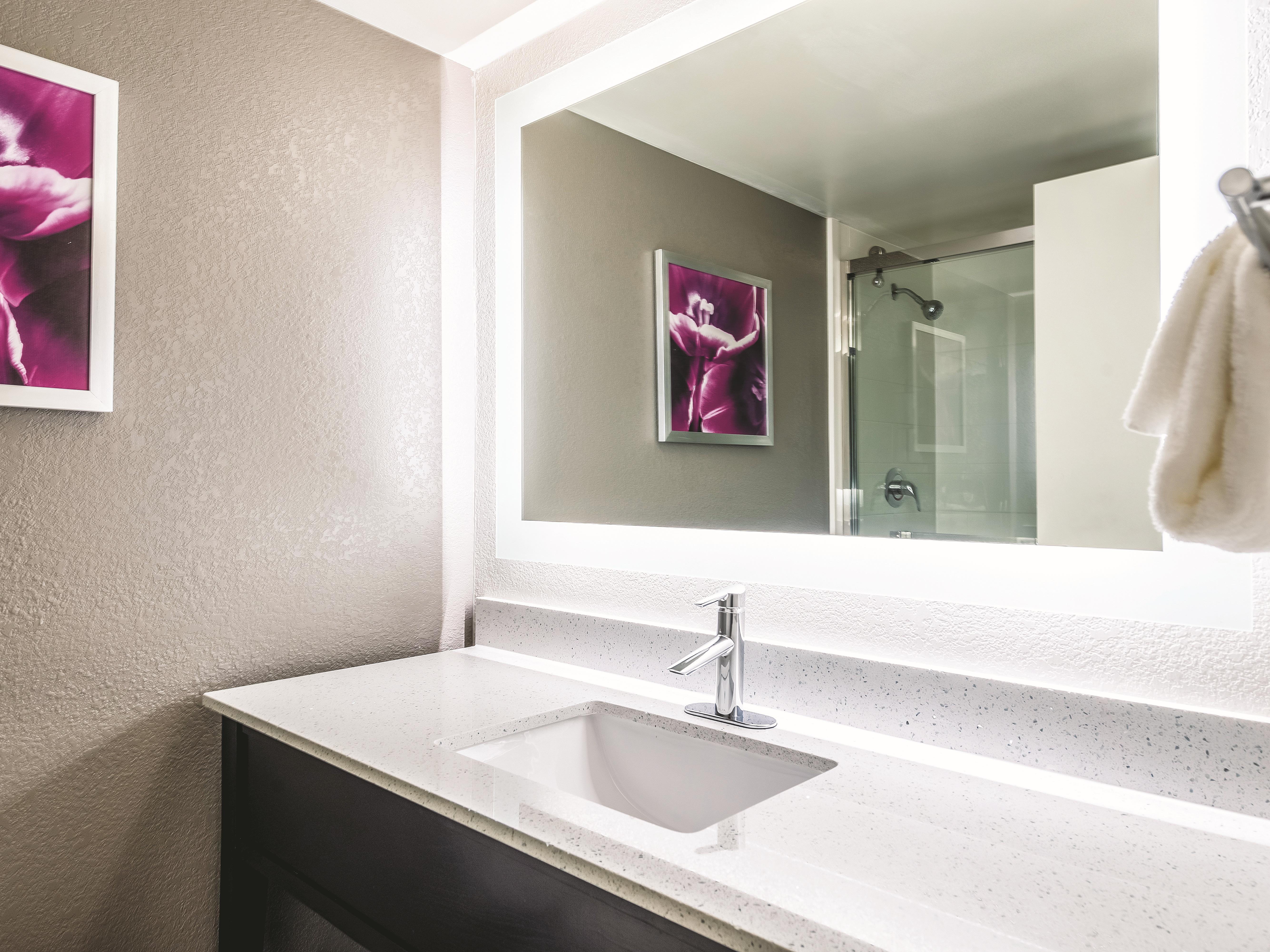 Guest room at the La Quinta Inn & Suites by Wyndham Cincinnati Sharonville in Cincinnati, Ohio