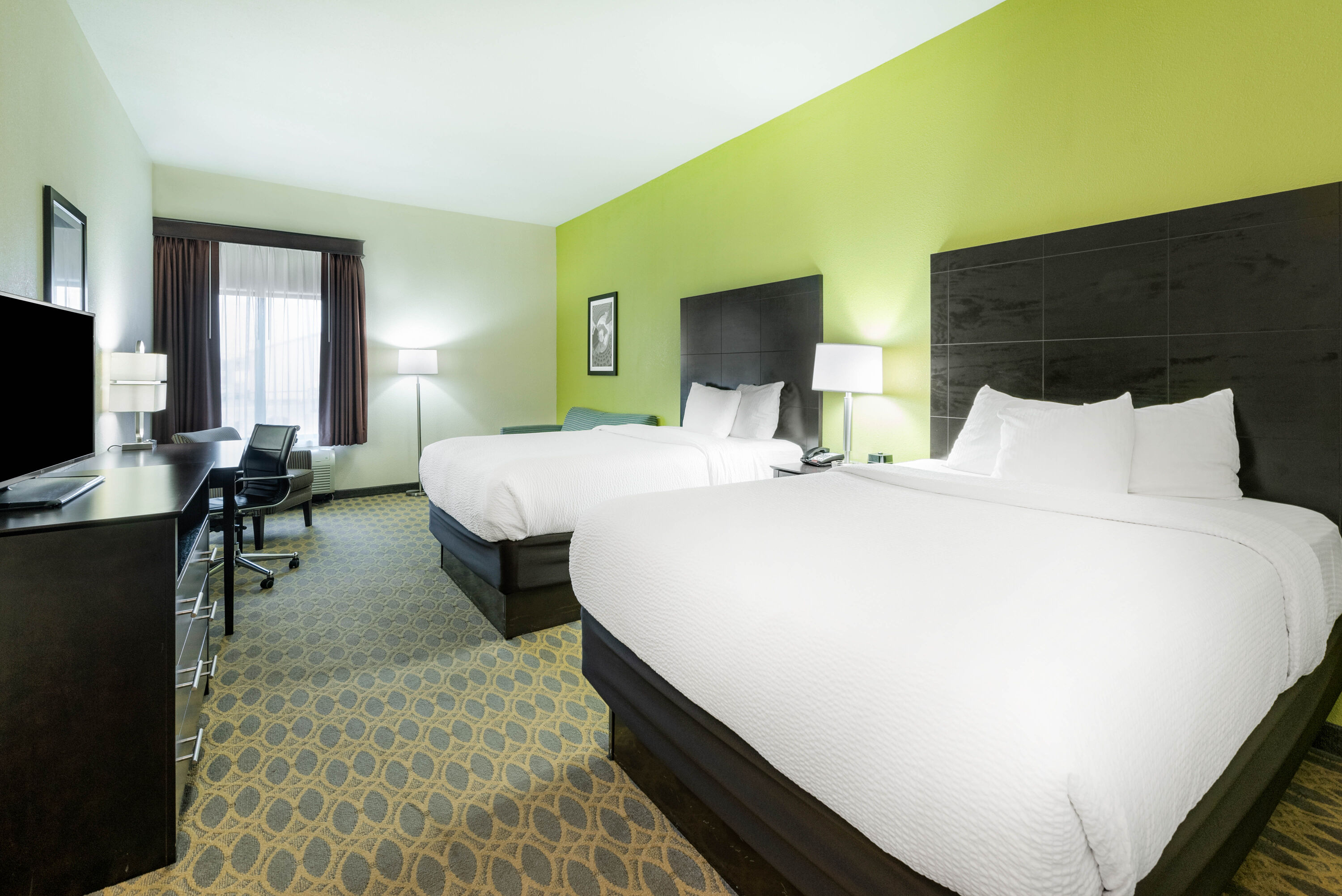 Guest room at the La Quinta Inn & Suites by Wyndham Columbus - Grove City in Grove City, Ohio