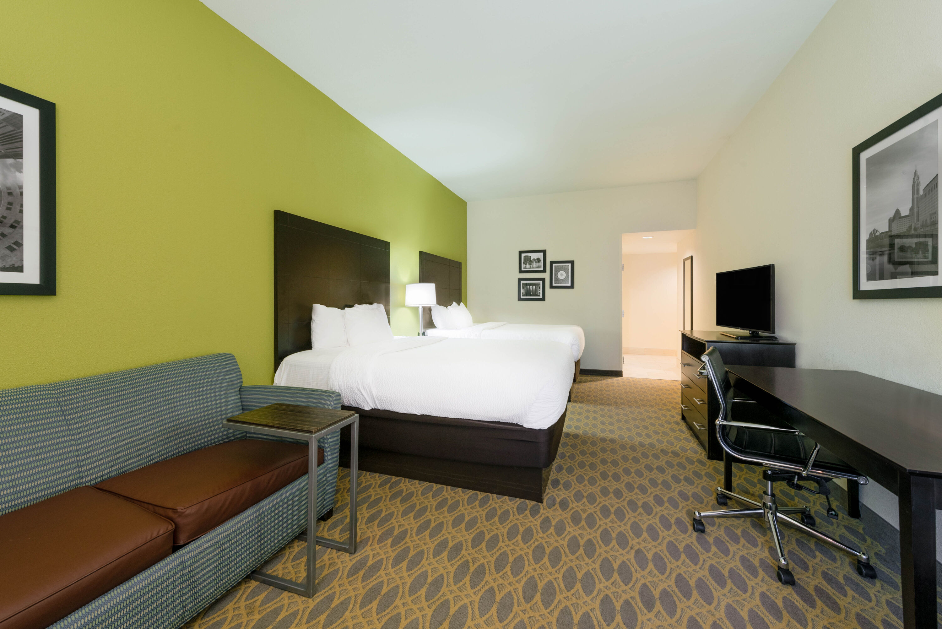 Guest room at the La Quinta Inn & Suites by Wyndham Columbus - Grove City in Grove City, Ohio